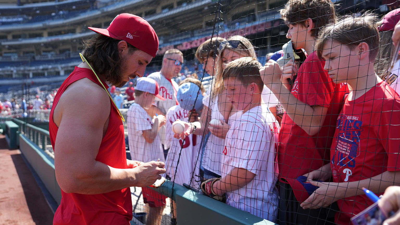 Michael Lorenzen signs autographs for young fans