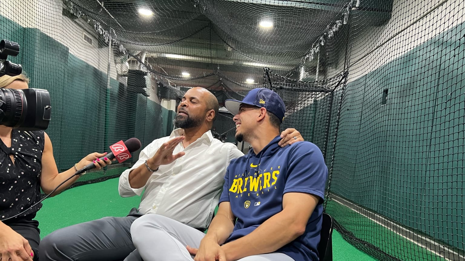 Barry Larkin and Willy Adames sit together while being interviewed