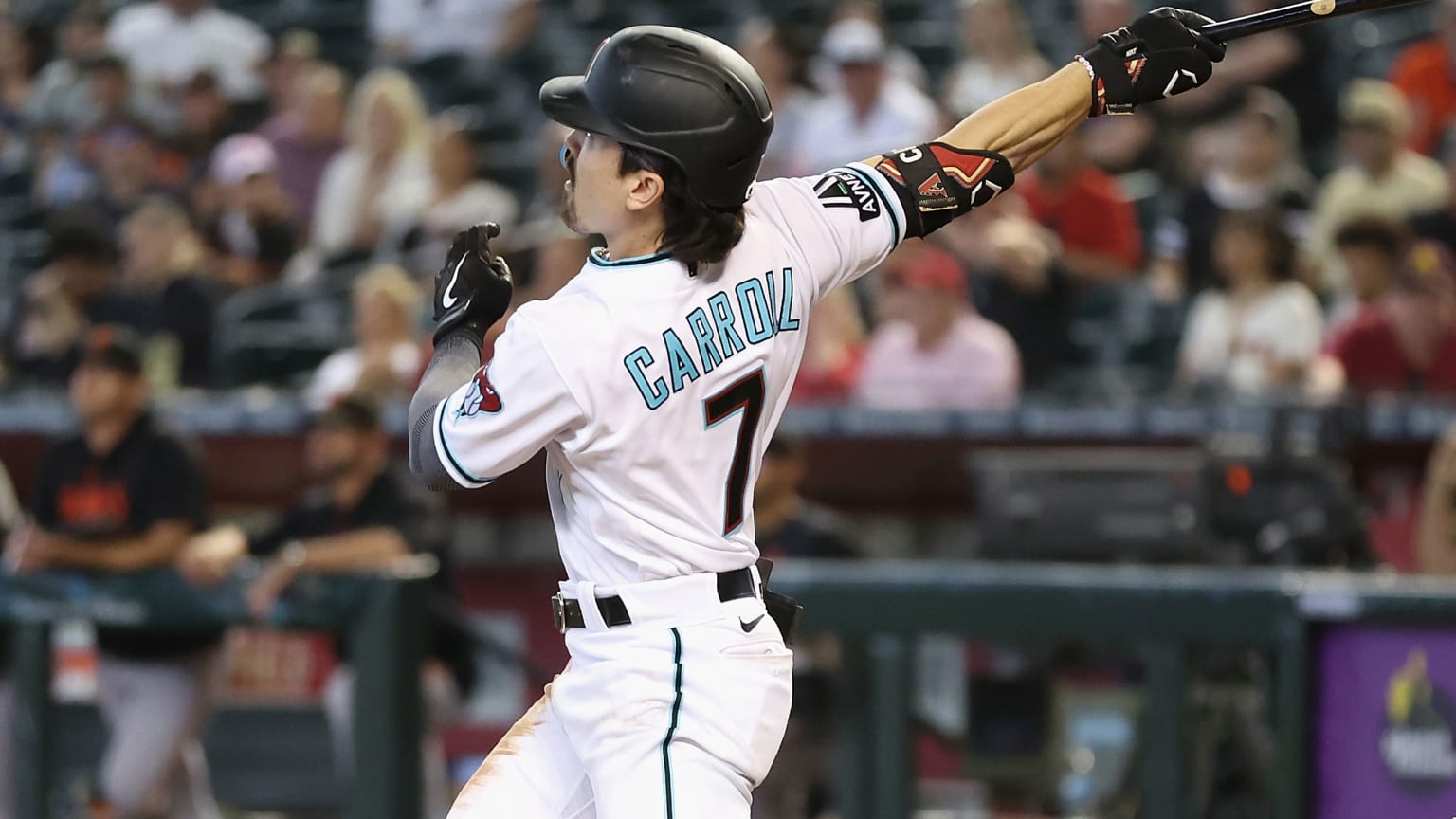 Corbin Carroll follows through on a home run swing