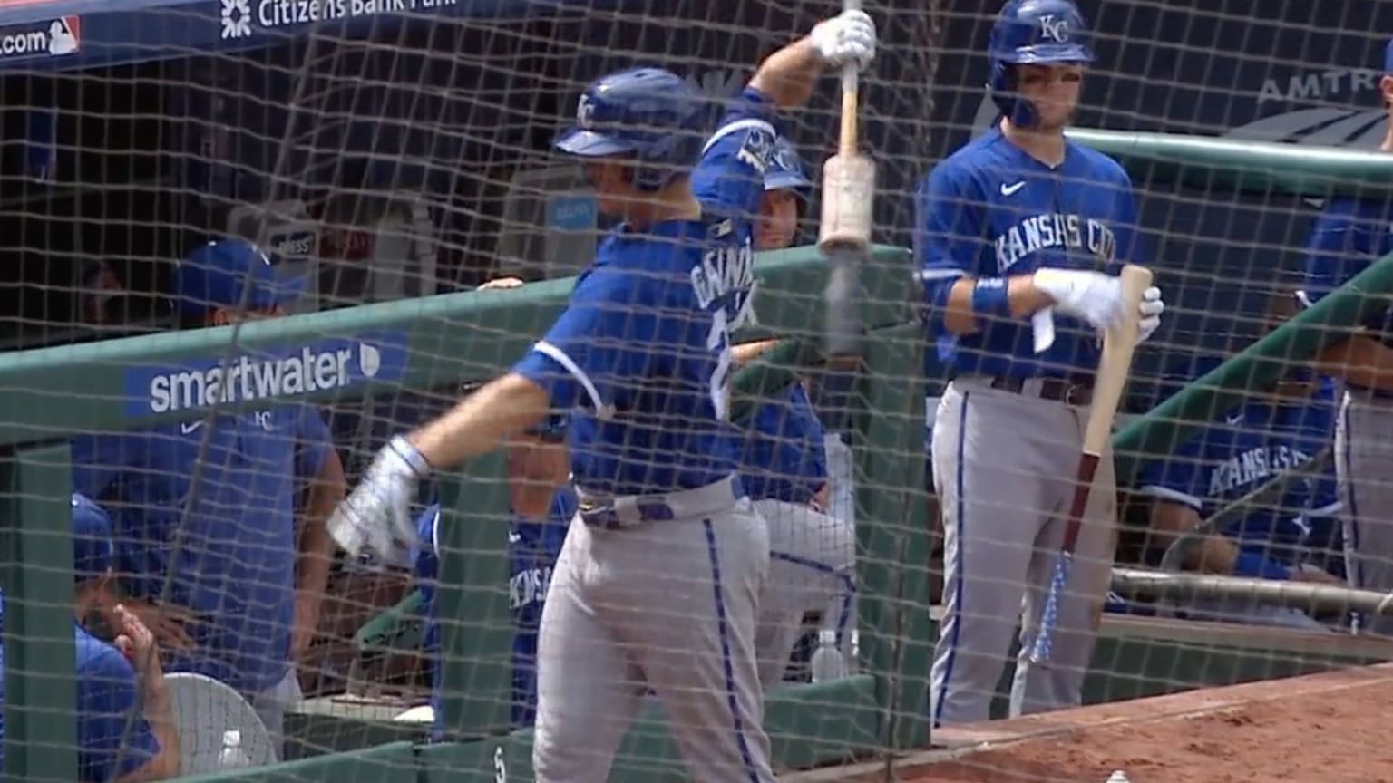 Zack Greinke swings a bat in the on-deck circle