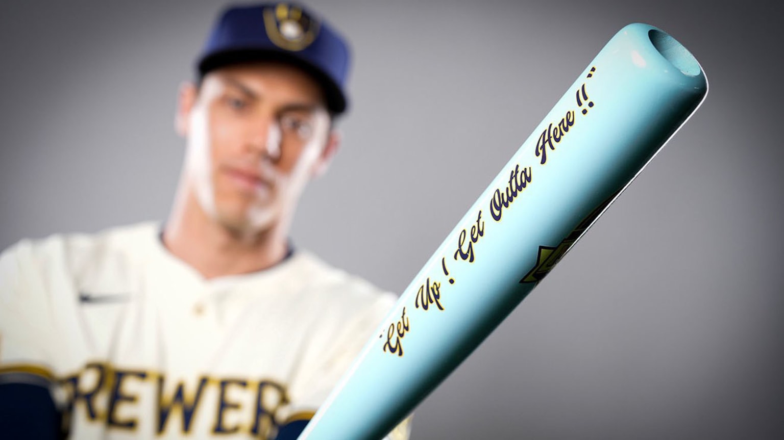 Christian Yelich's bat quotes Bob Uecker's home run call: ''Get up! Get outta here!''