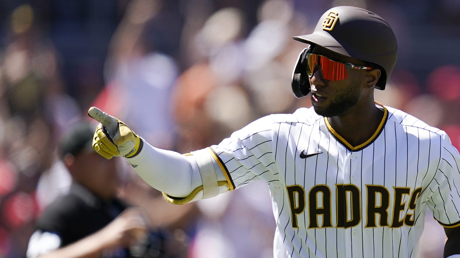 Jurickson Profar points while playing for the Padres last season