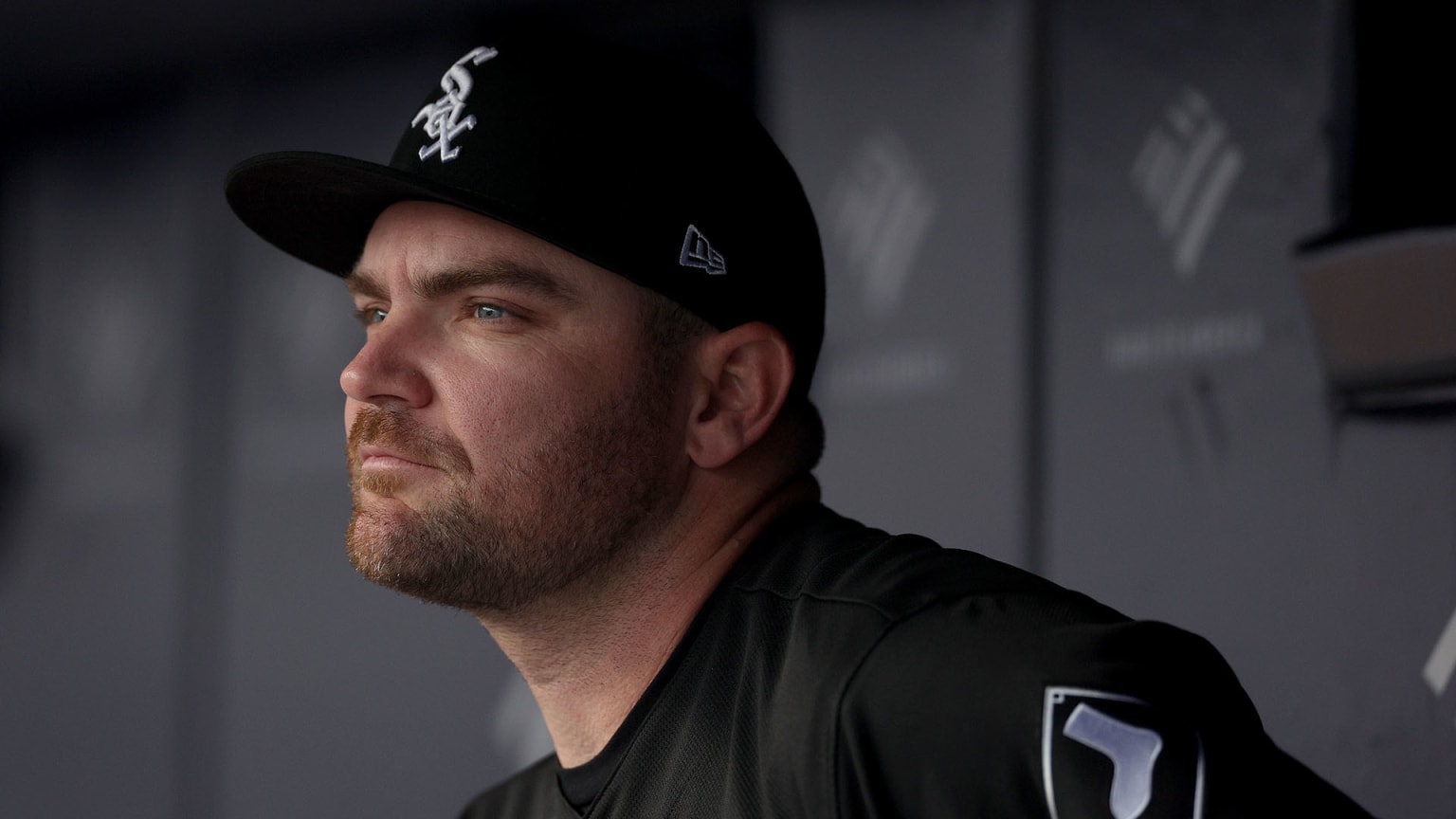 Liam Hendriks sits in the dugout