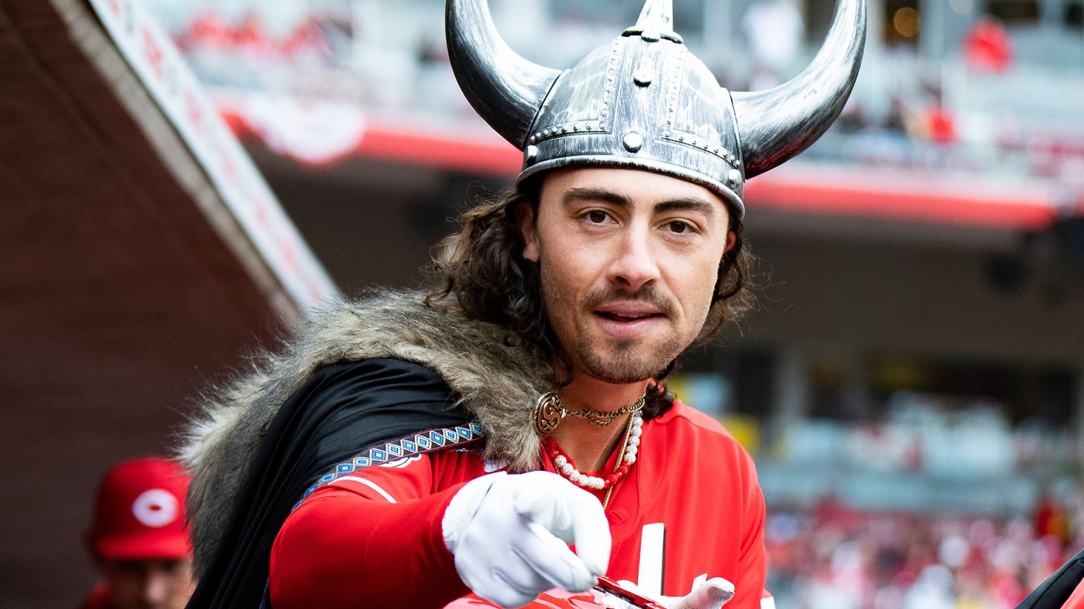 Jonathan India wears a viking helmet and fur-lined cape over his Reds uniform