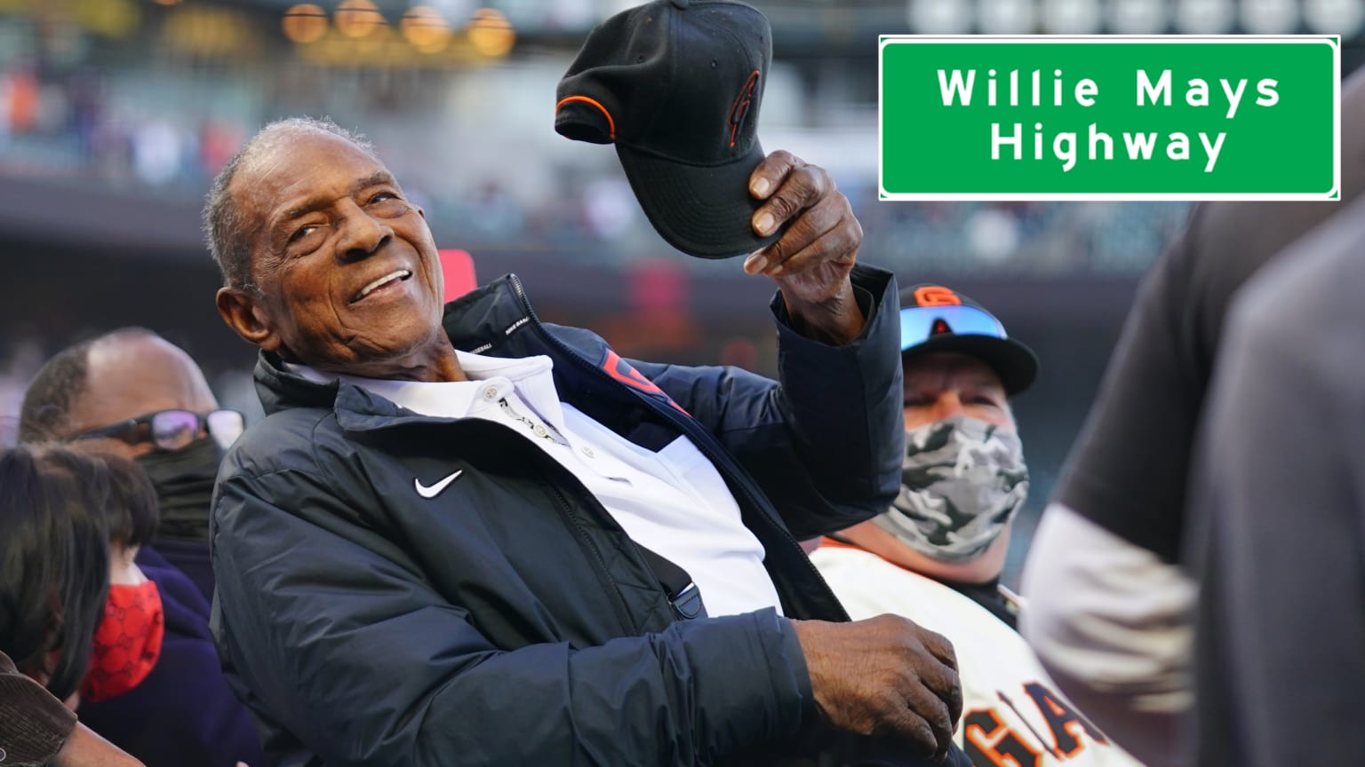 An image of Willie Mays tipping his cap with an overlay of a sign reading Willie Mays Highway