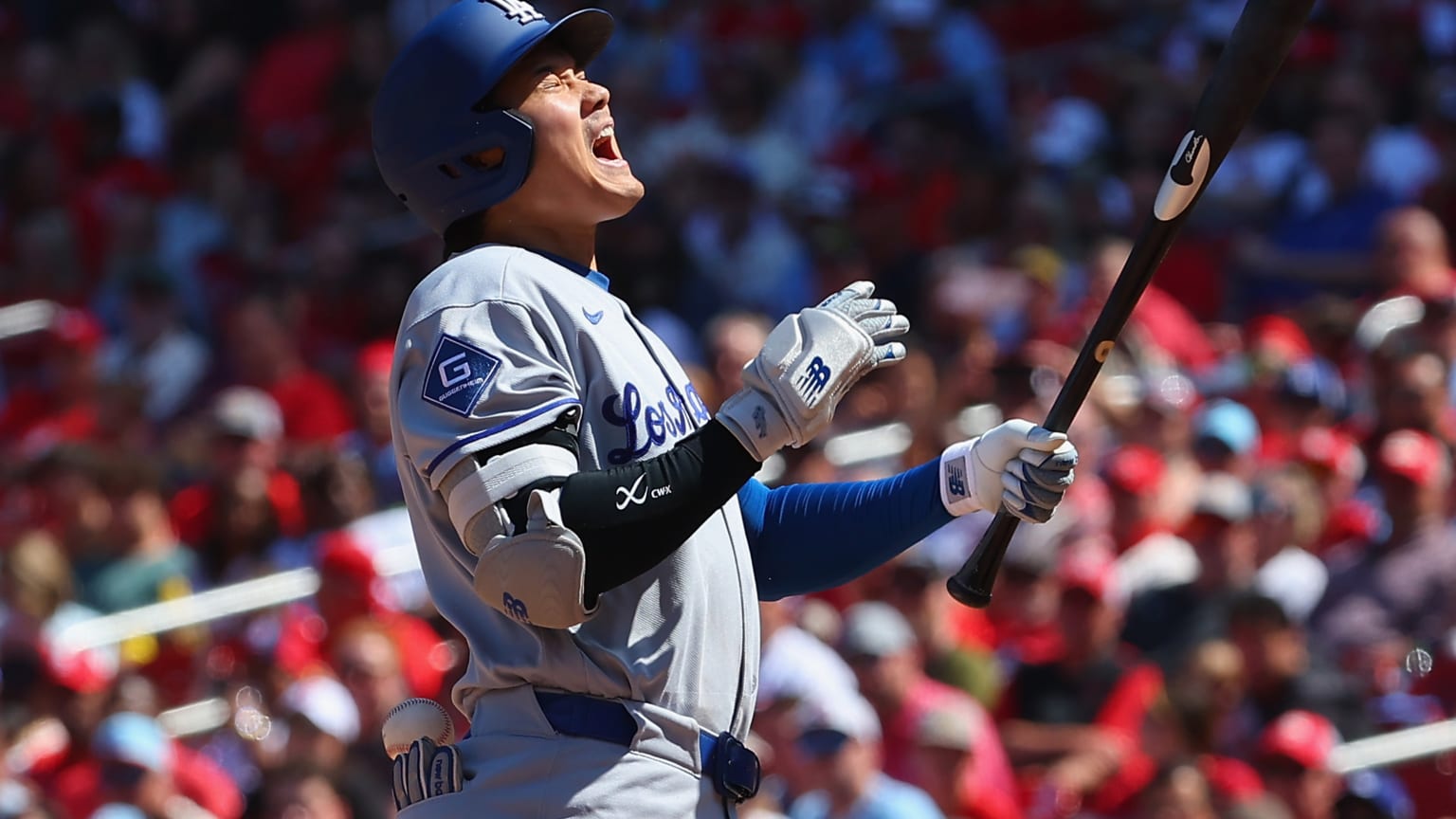Shohei Ohtani reacts to getting hit by a pitch