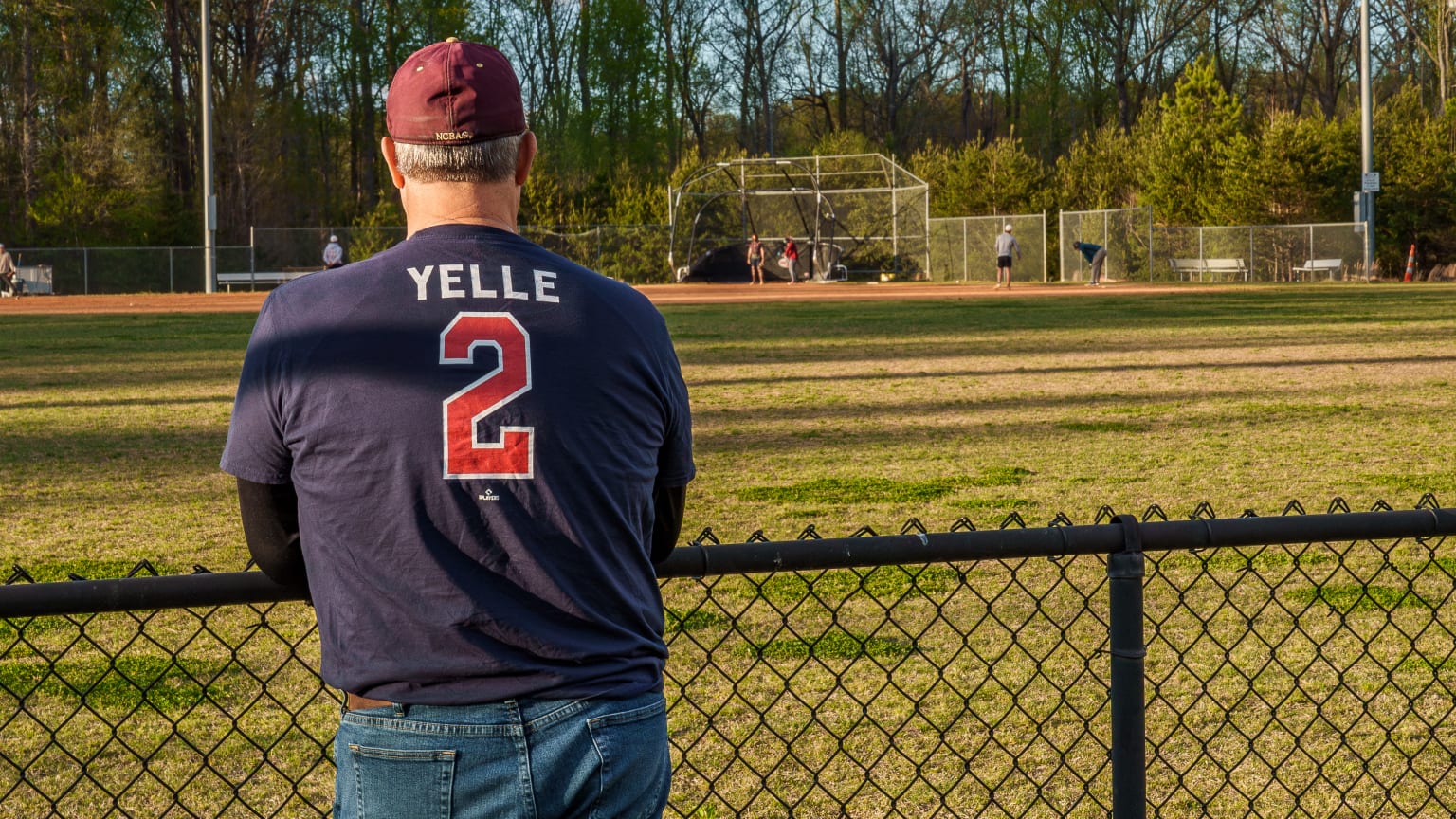 Scott Yelle looks out at a baseball field