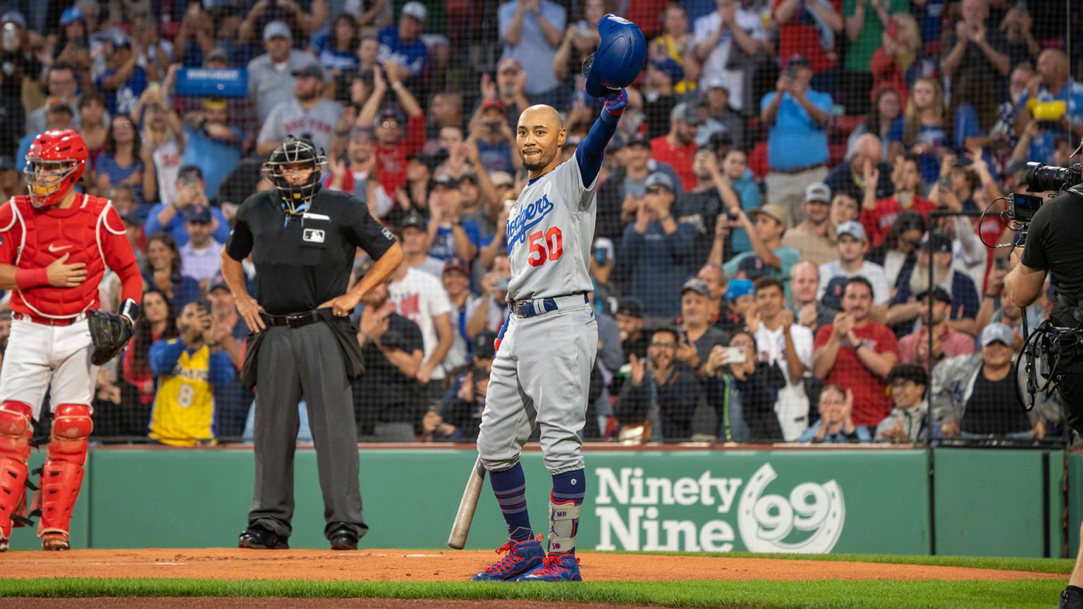 Mookie Betts tips his helmet to the Fenway Park crowd