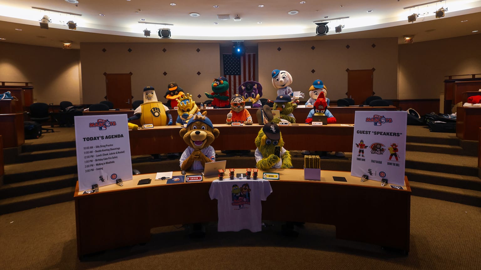 Several MLB mascots in a conference room