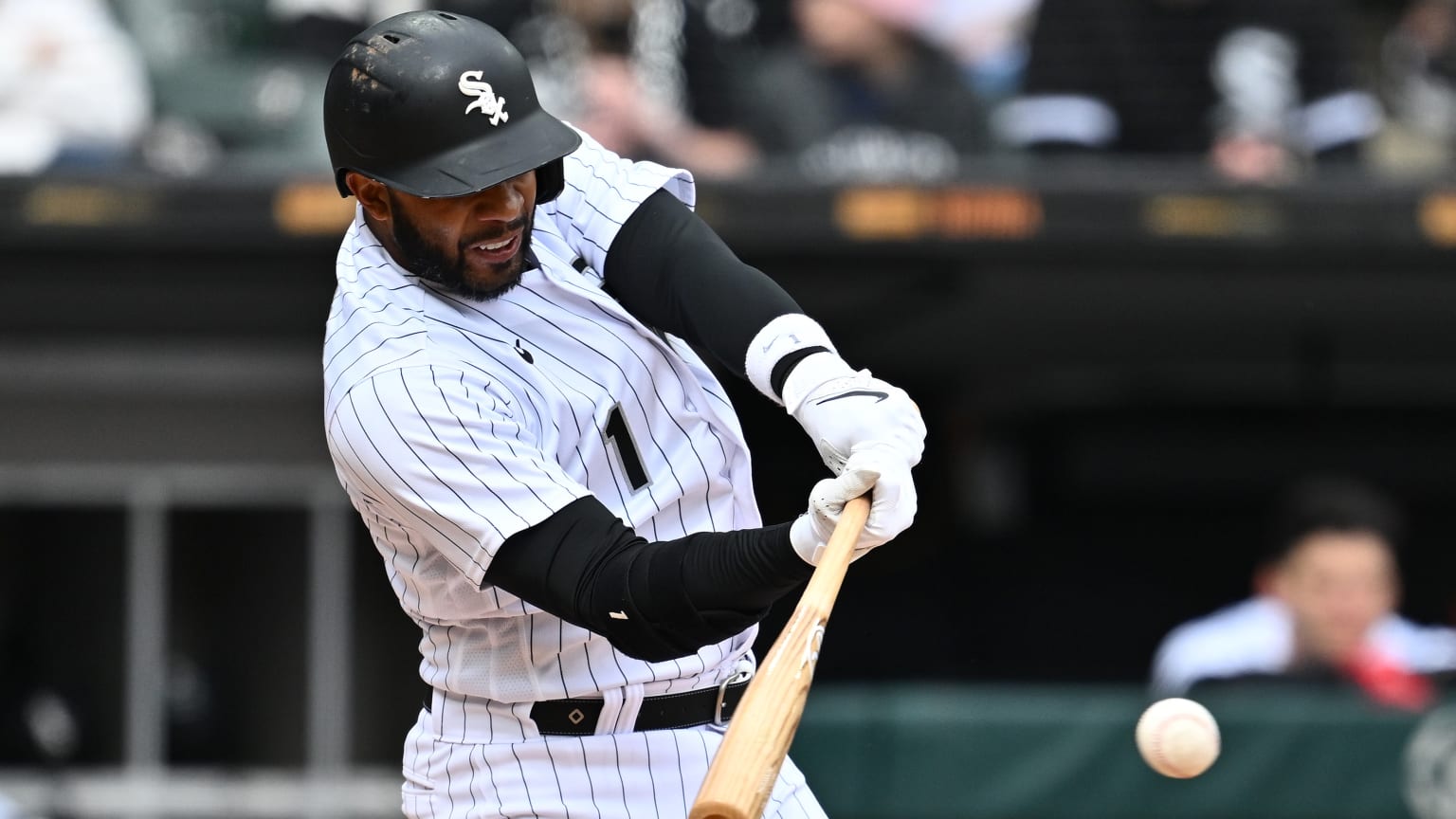 Elvis Andrus, in a White Sox uniform, swings a bat