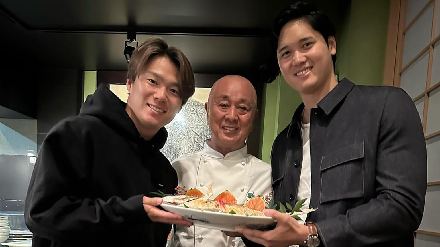 Yoshinobu Yamamoto and Shohei Ohtani pose with chef Nobu Matsuhisa