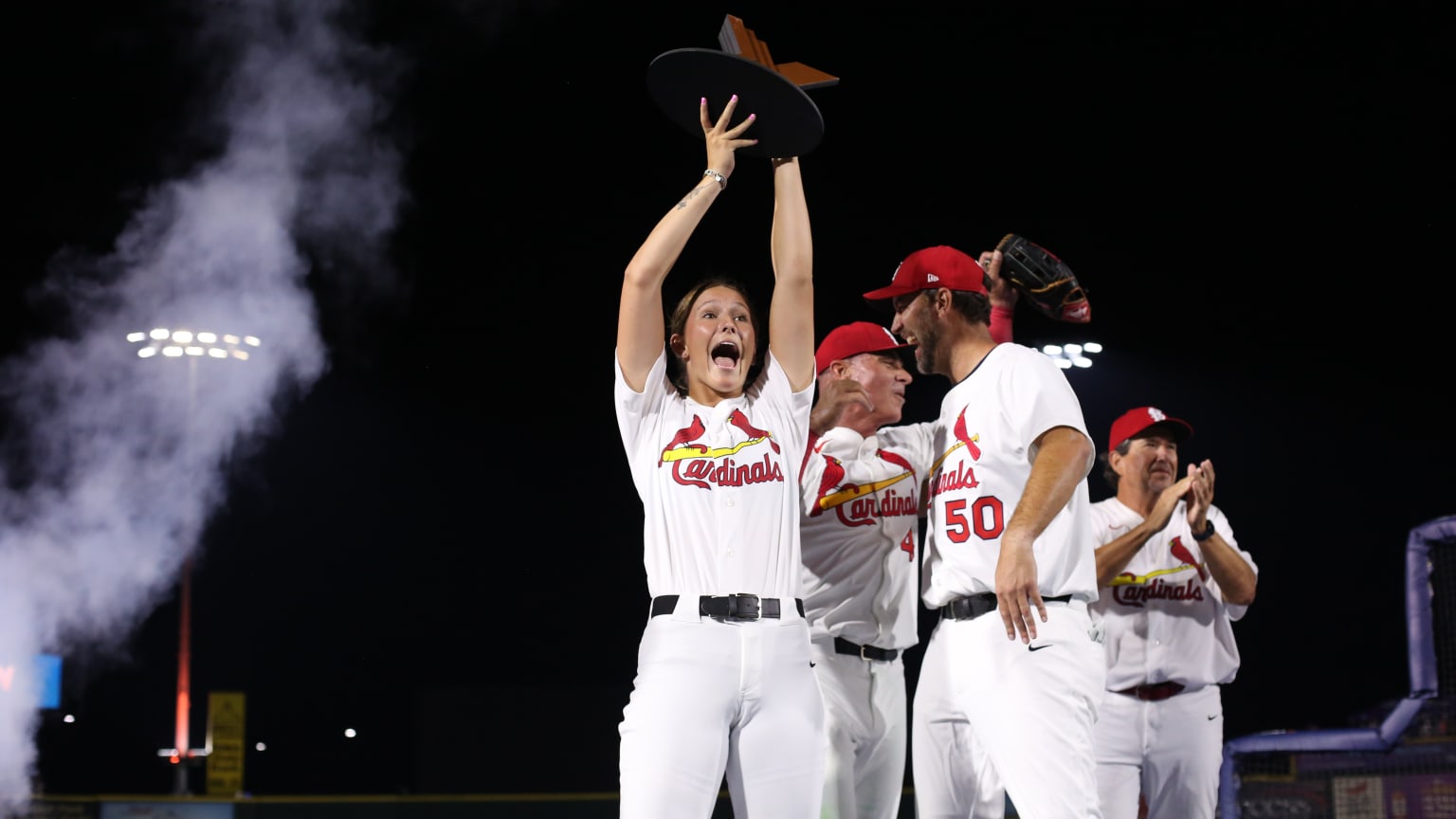 The Cardinals' Home Run Derby X team celebrates with the trophy