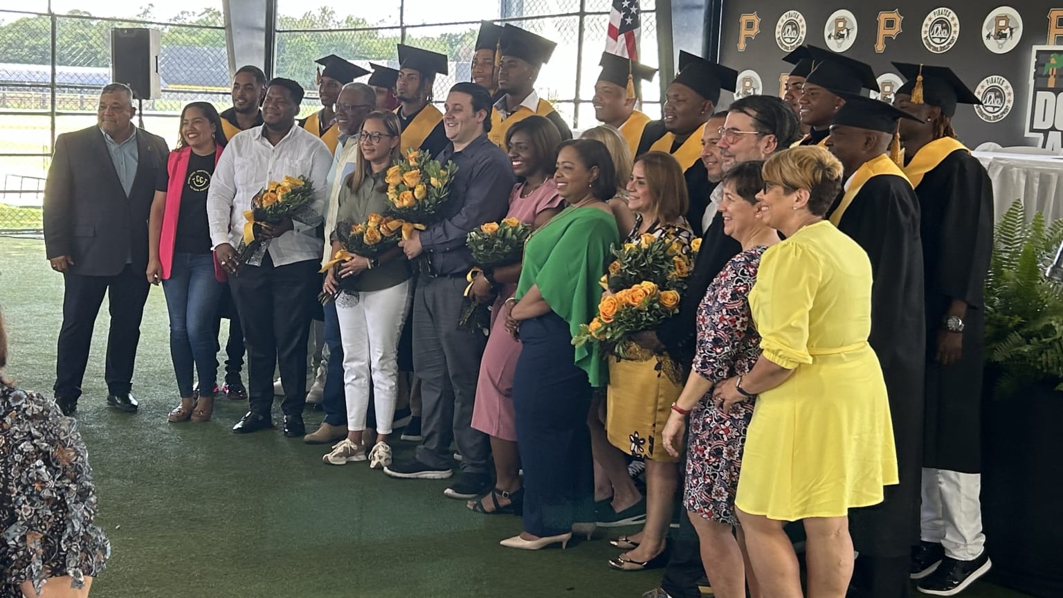 A group photo of graduates from the Pirates' academy