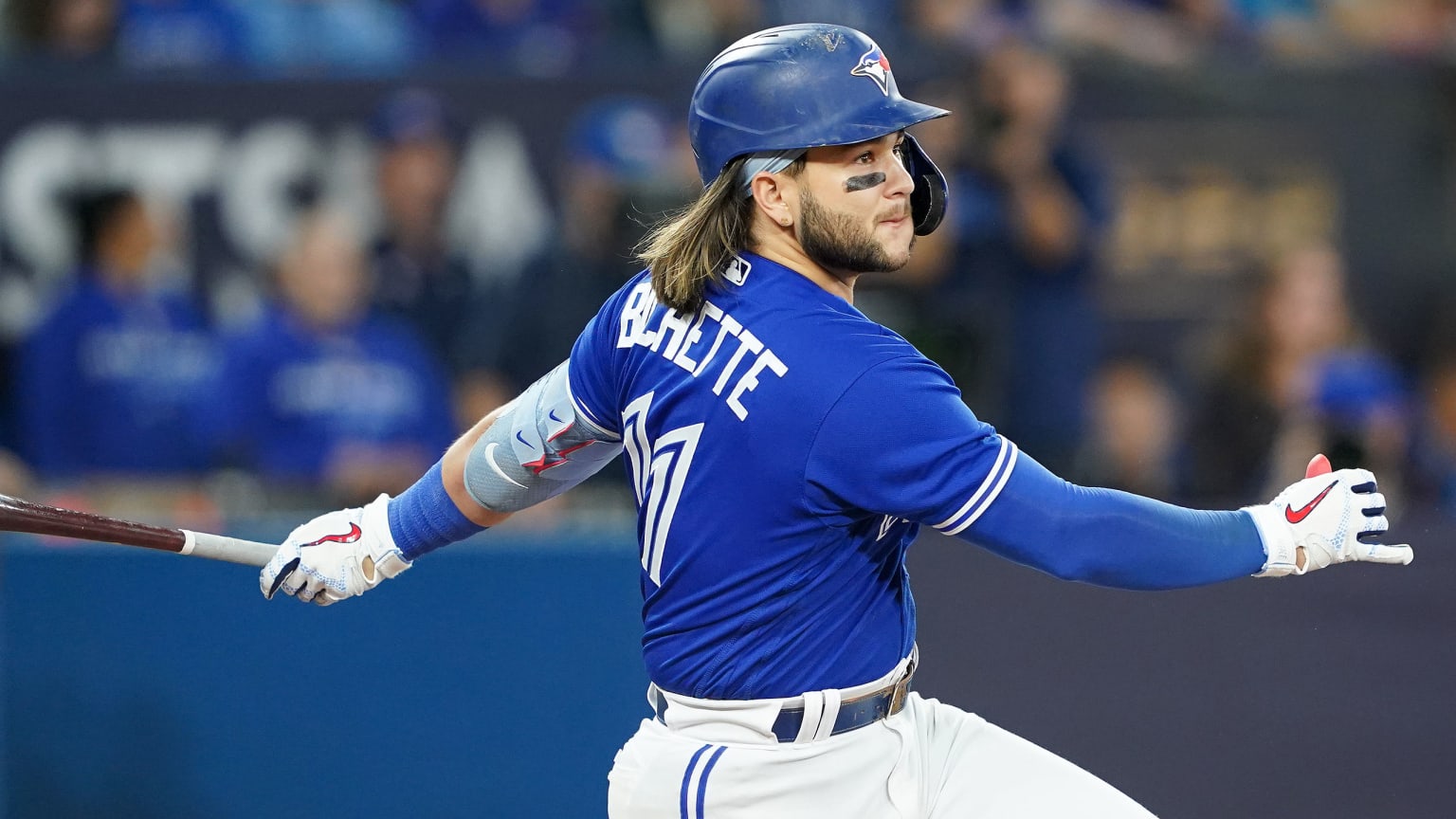 Bo Bichette follows through on a swing