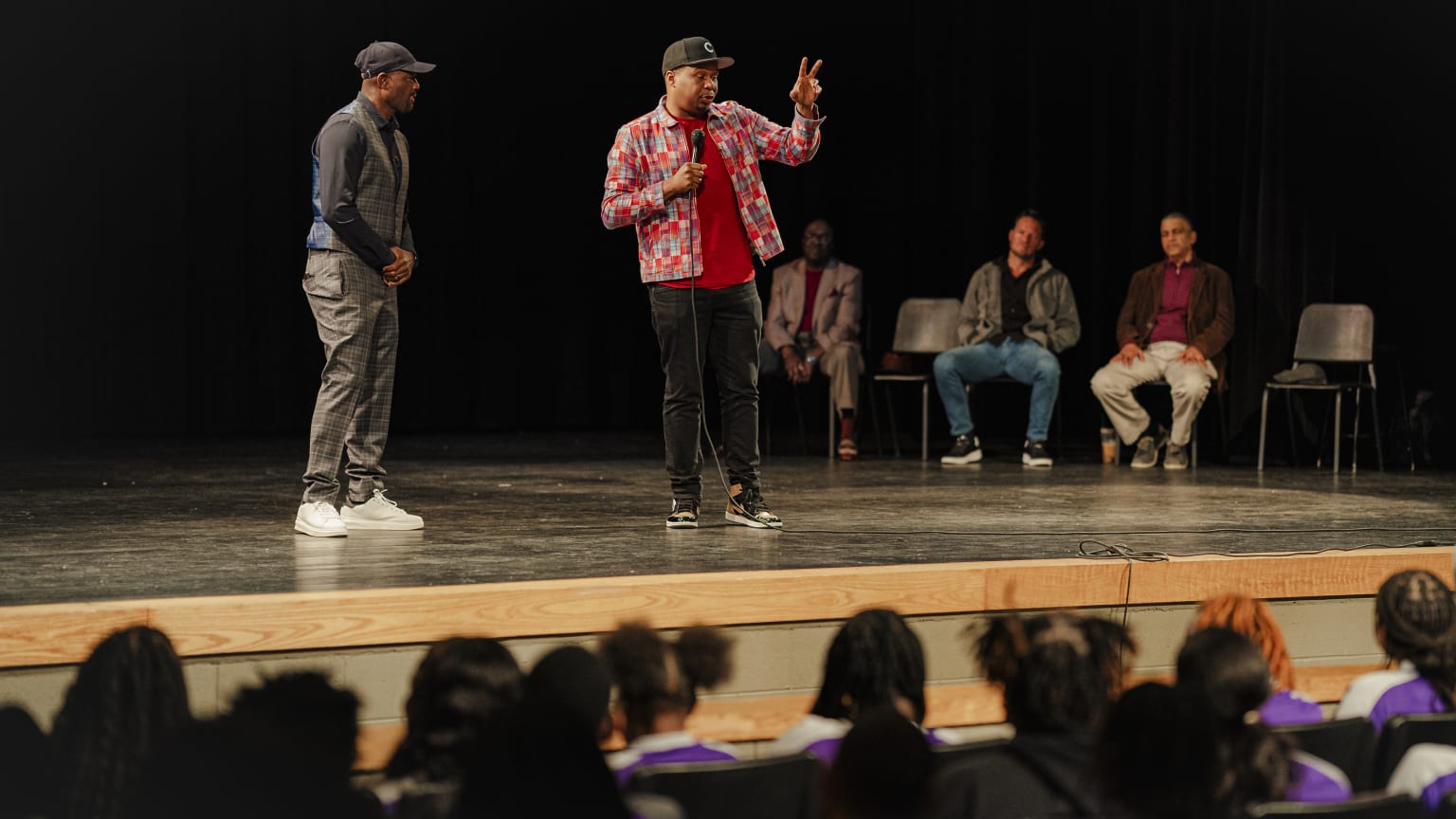 Harold Reynolds and comedian Roy Wood Jr. speak to students at Birmingham schools