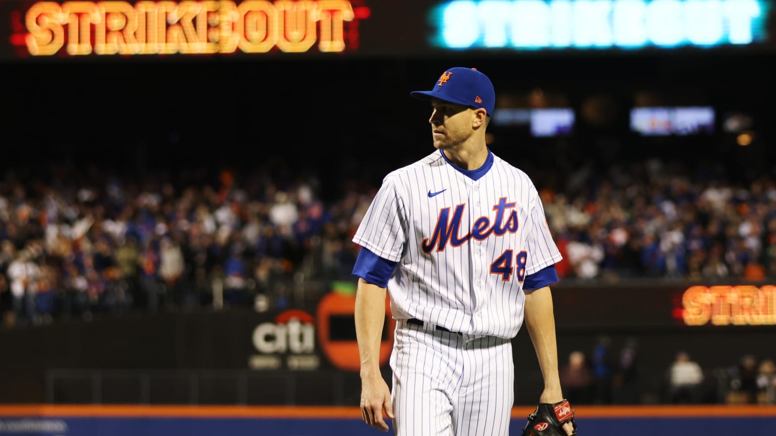 Jacob deGrom looks toward the dugout after a strikeout