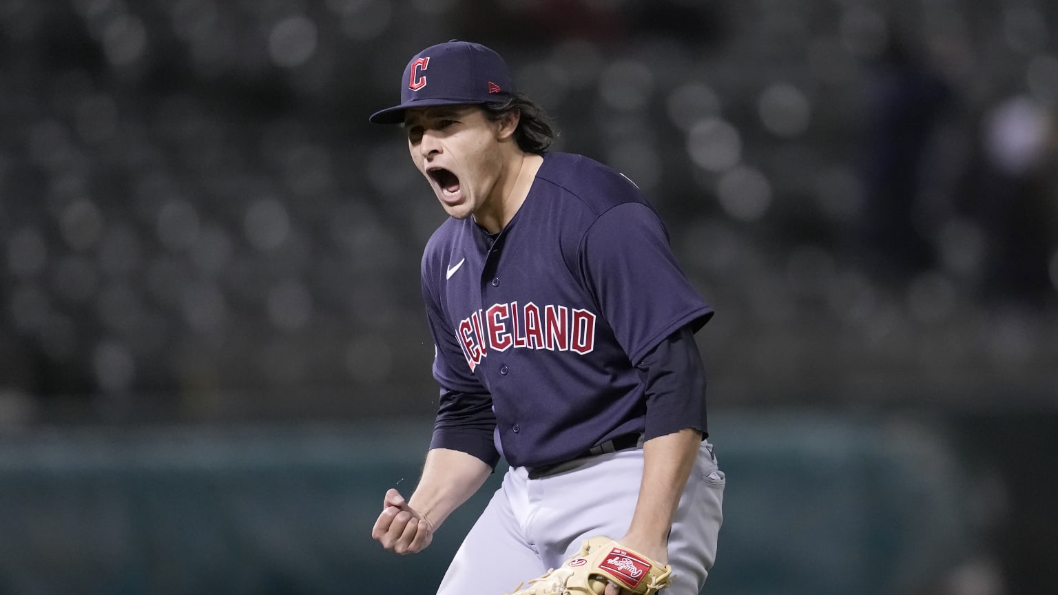 Eli Morgan celebrates after recording an out