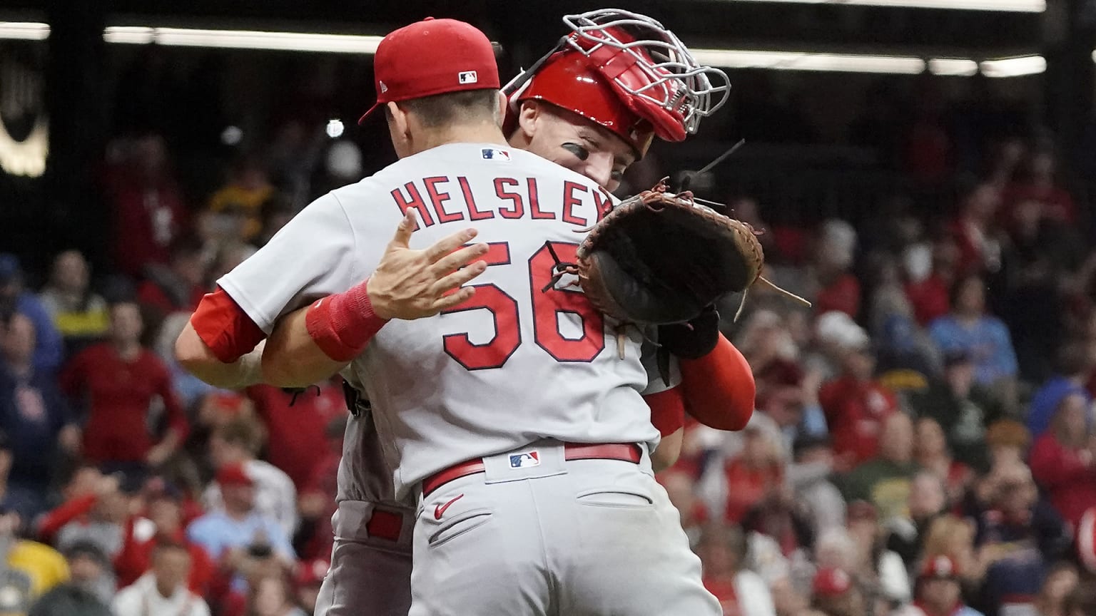Cardinals pitcher Ryan Helsley hugs his catcher after the final out