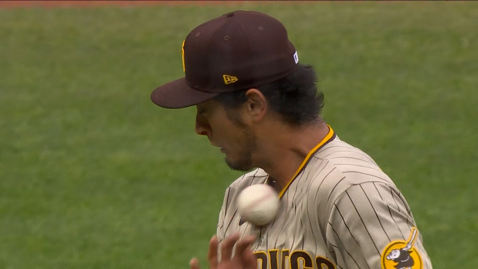 Padres pitcher Yu Darvish is hit in the chest by a baseball