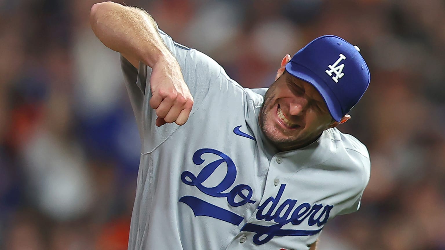 Then-Dodgers pitcher Max Scherzer pumps his fist in celebration