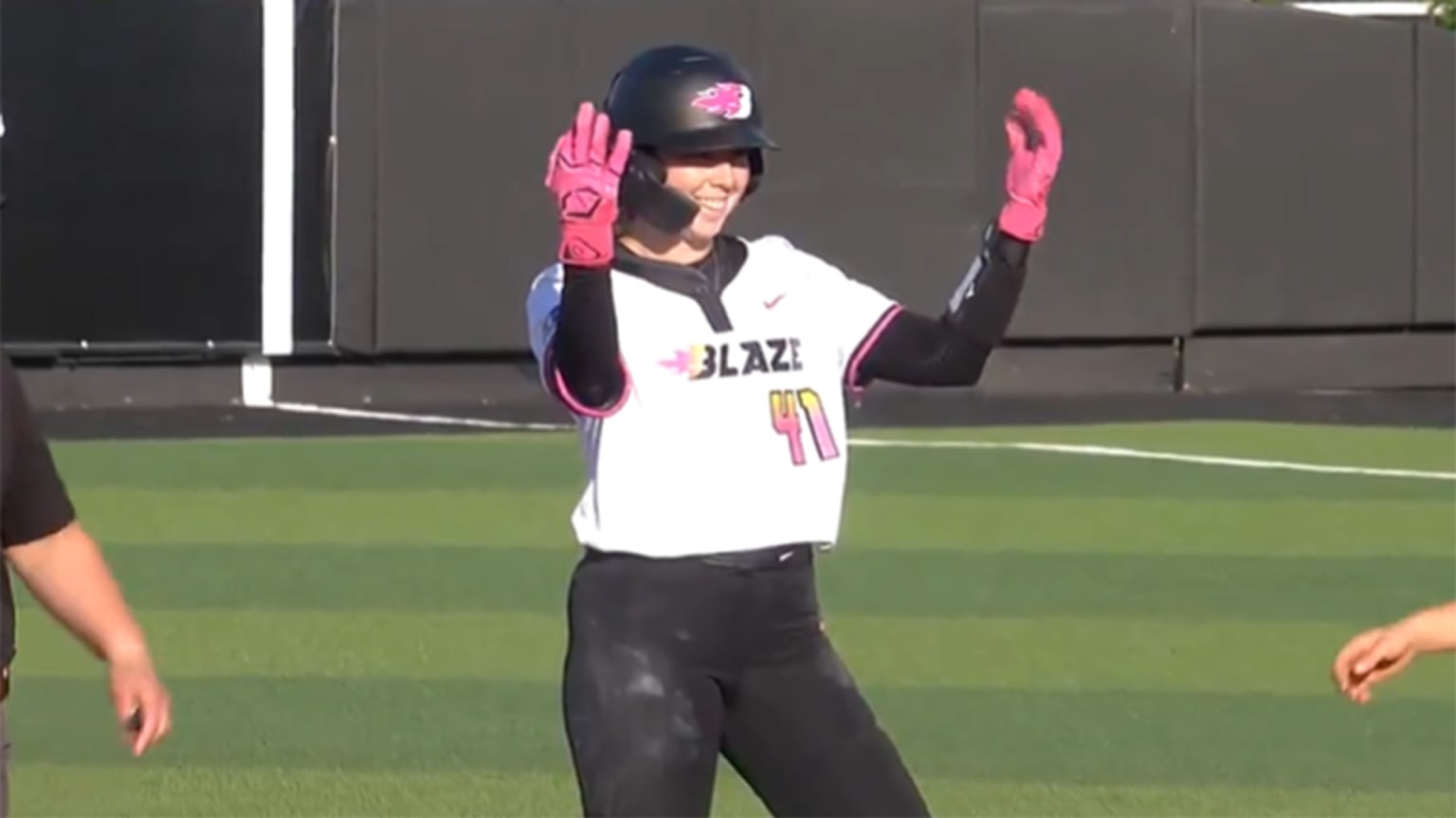 Danielle Gibson Whorton celebrates her RBI double