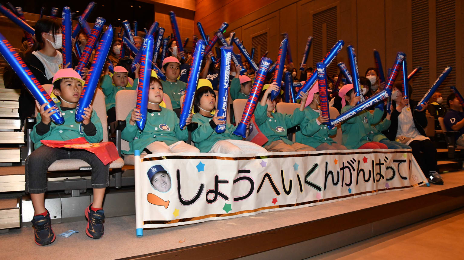 School children cheer on Shohei Ohtani in Oshu City, Japan