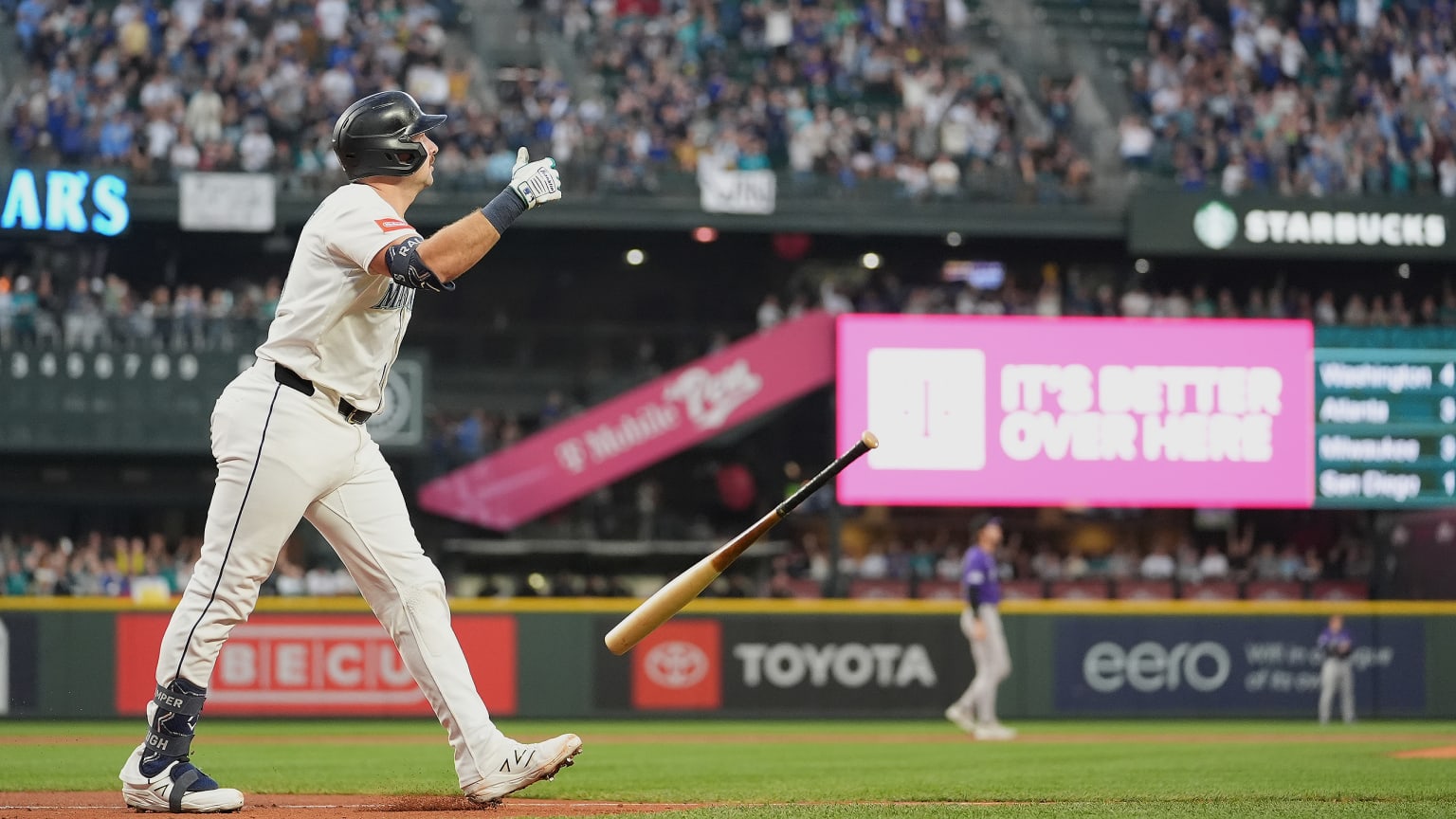 Cal Raleigh admires the first of his two homers last night