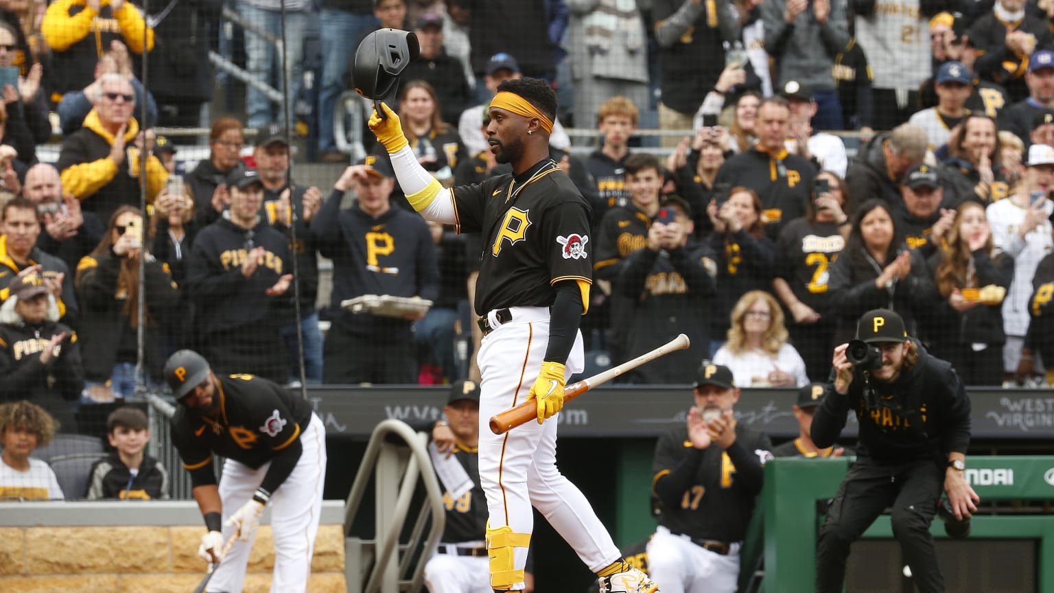 Andrew McCutchen doffs his helmet as the Pittsburgh fans give him a standing ovation