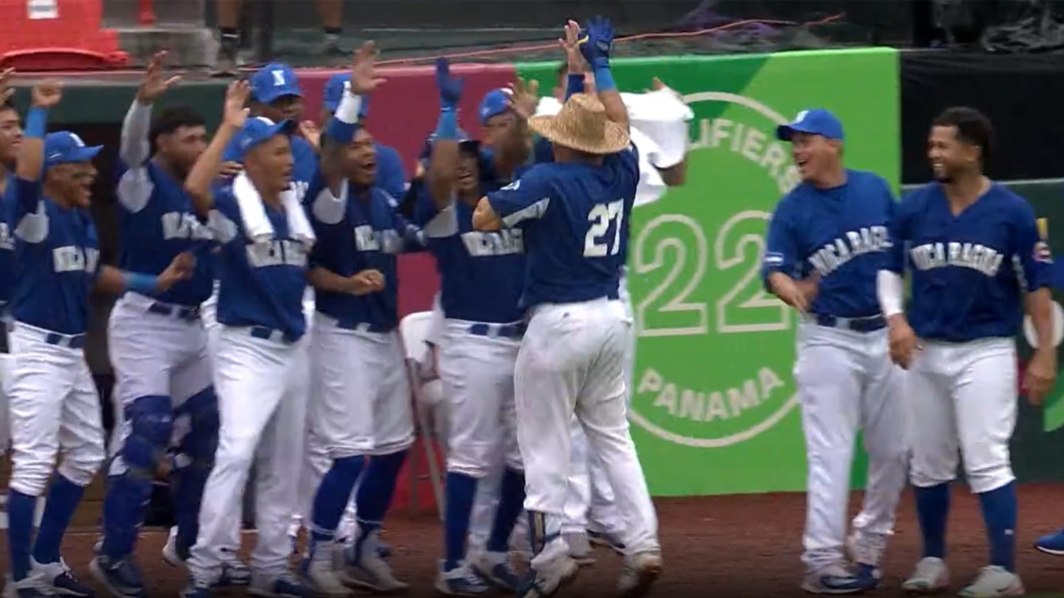 Players for Nicaragua celebrate after a home run