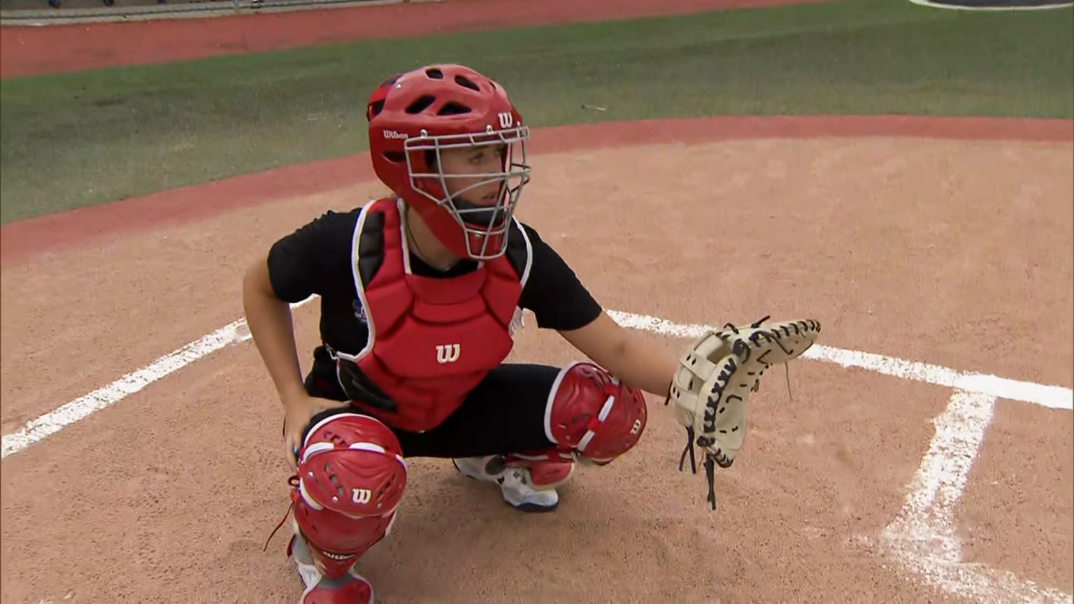 High school catcher Karley Clark behind the plate