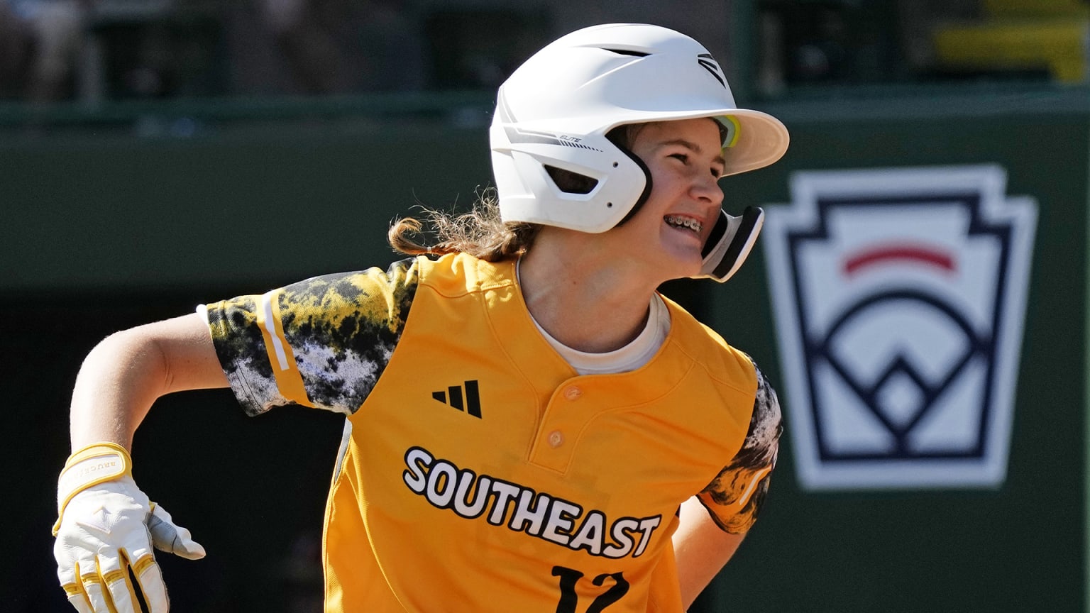 Stella Weaver smiles during a Little League World Series game