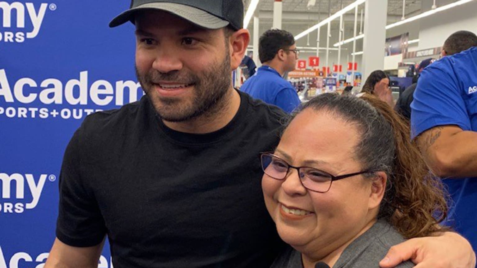 Jose Altuve poses for a picture with a fan