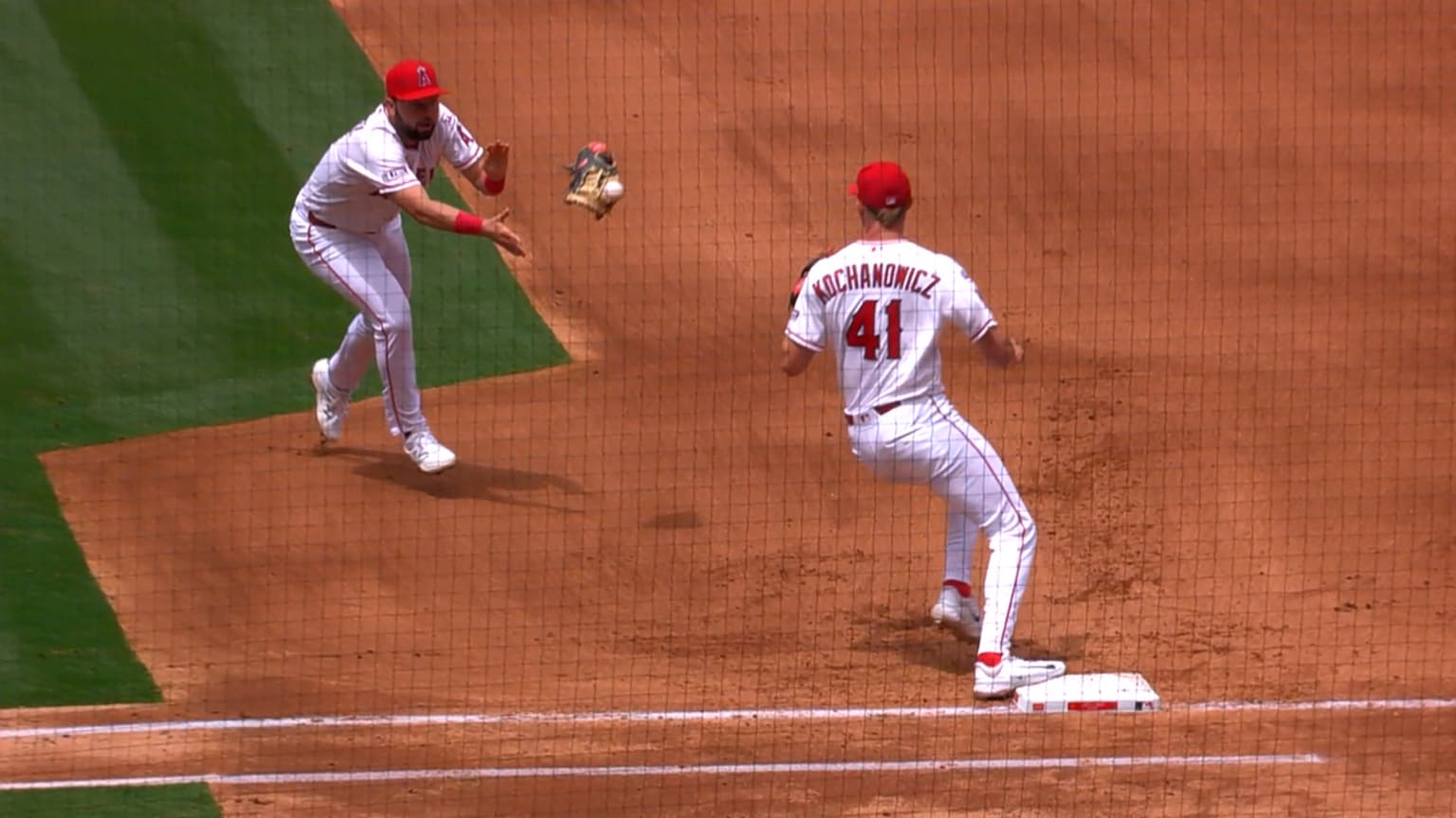 Nolan Schanuel tosses his glove with the ball inside to Jack Kochanowicz