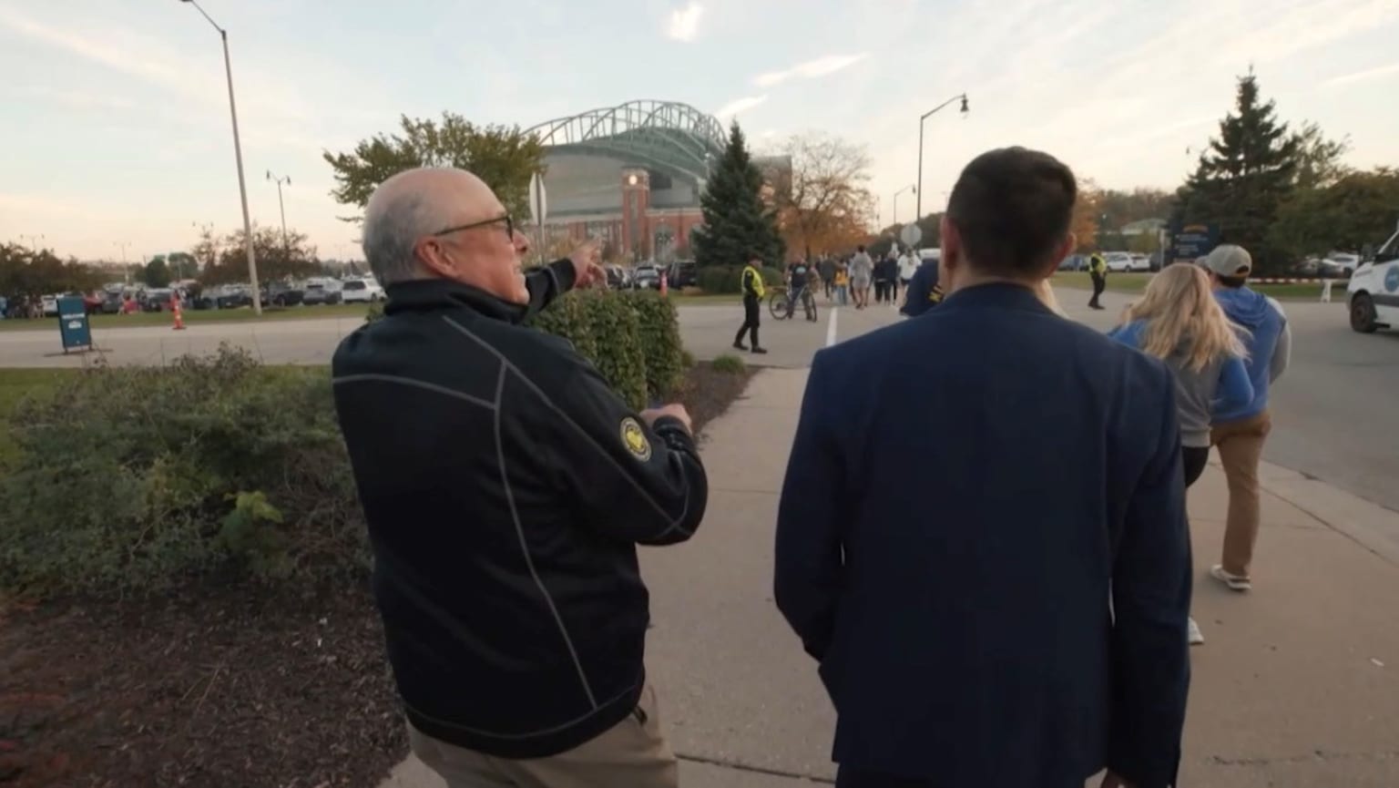 Brewers fan Bob Koehler walks to American Family Field with MLB Network's Robert Flores Brewers fan Bob Koehler walks to American Family Field with MLB Network's Robert Flores