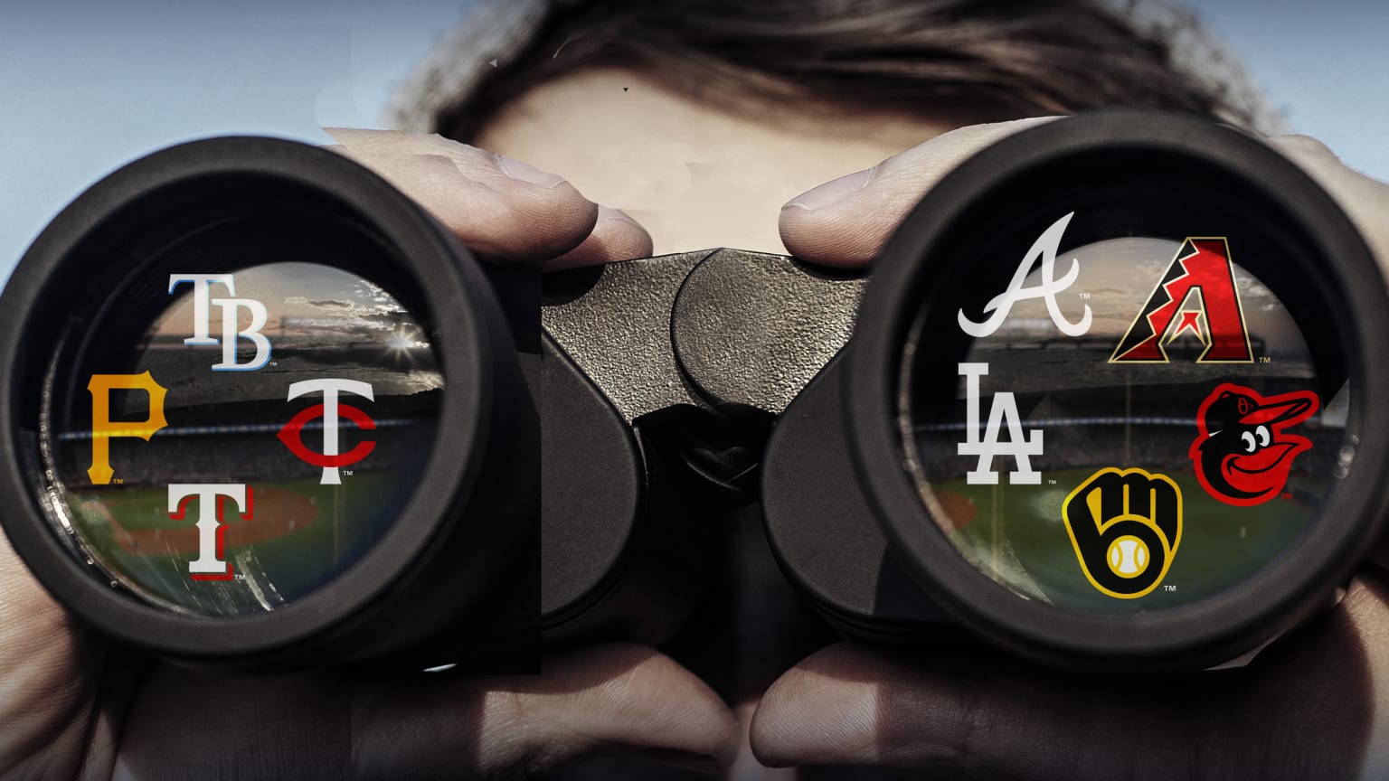A person looking through binoculars with logos of 9 teams on the lenses