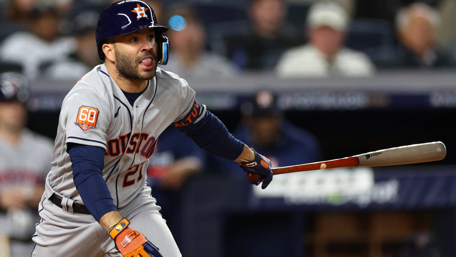 Jose Altuve breaks from the batter's box after hitting the ball