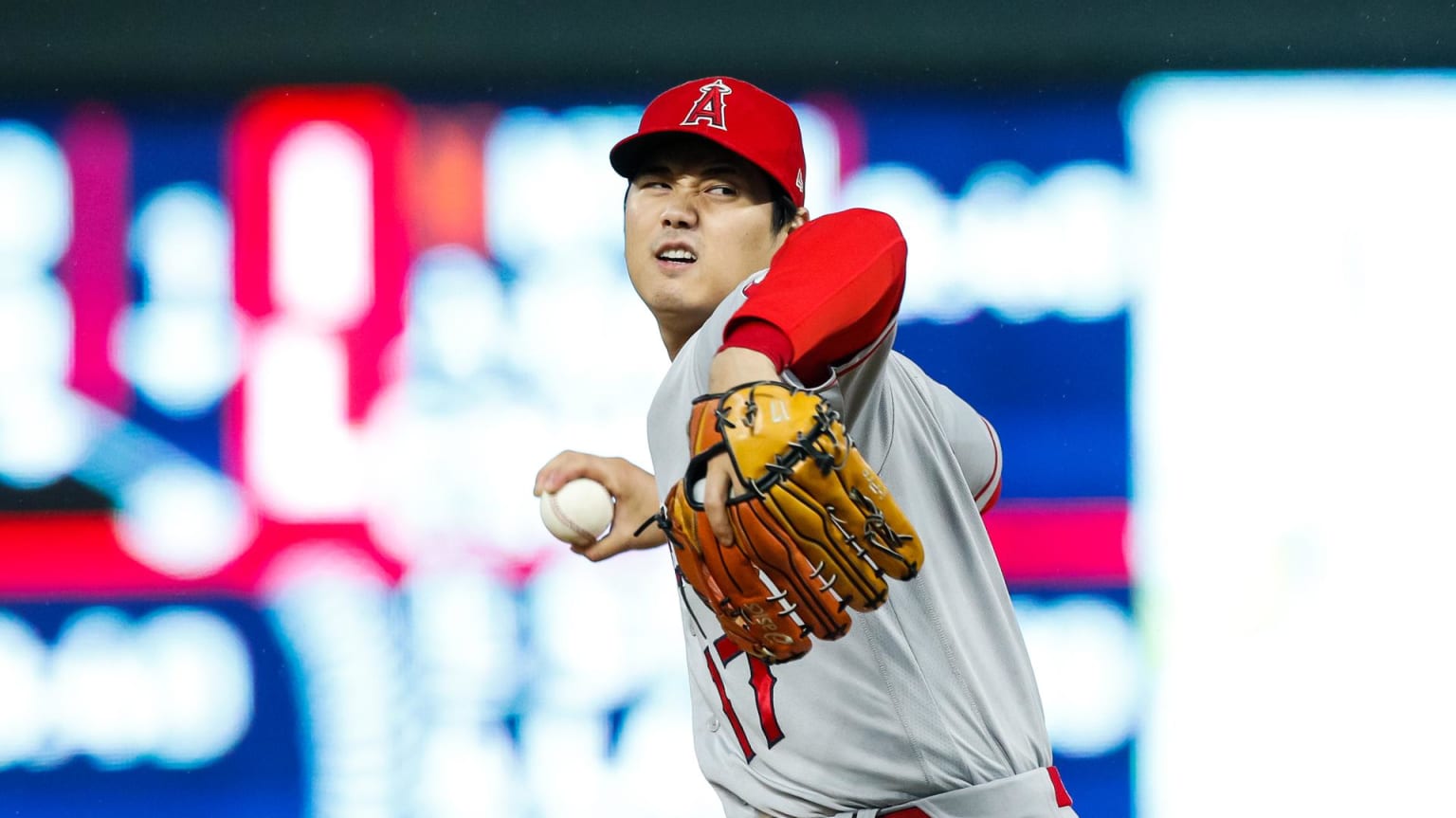 Shohei Ohtani winding up to throw a pitch