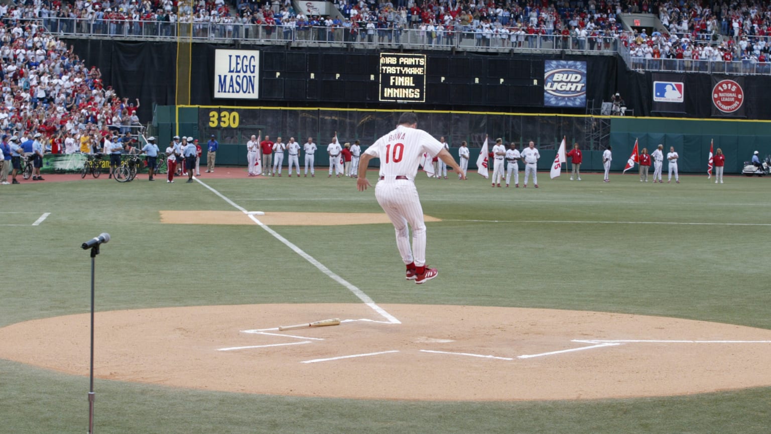 Philadelphia Phillies' Brad Lidge, right, and Carlos Ruiz celebrate after  winning Game 5 of the National League Championship baseball series against  the Los Angeles Dodgers Wednesday, Oct. 21, 2009, in Philadelphia. The