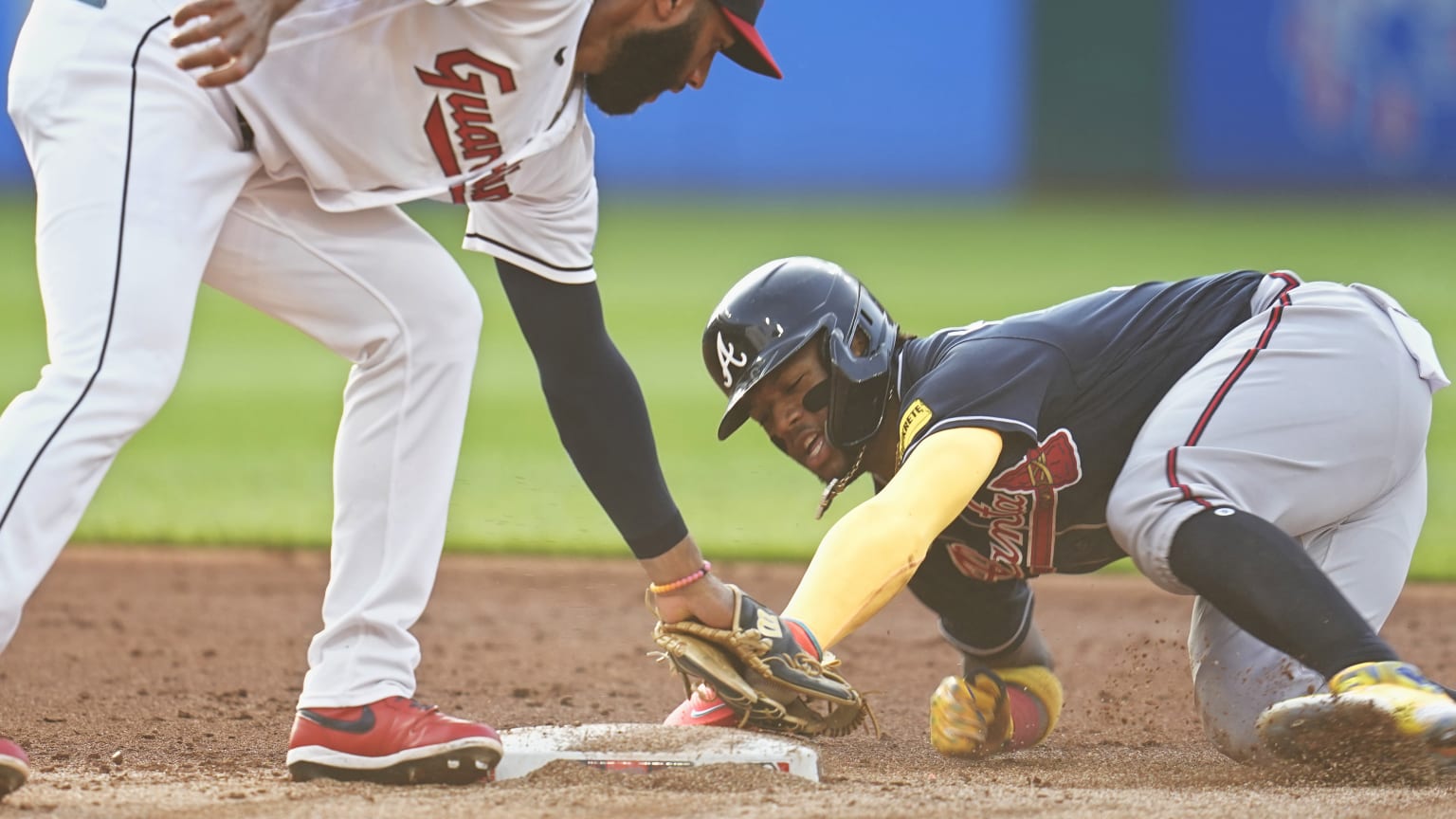 Ronald Acuña Jr. slides into second with a stolen base