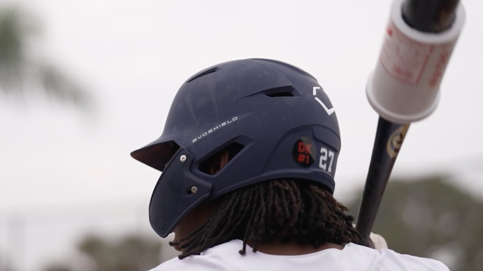 The Tigers RBI baseball team dons ''DK #1'' decals on its helmets