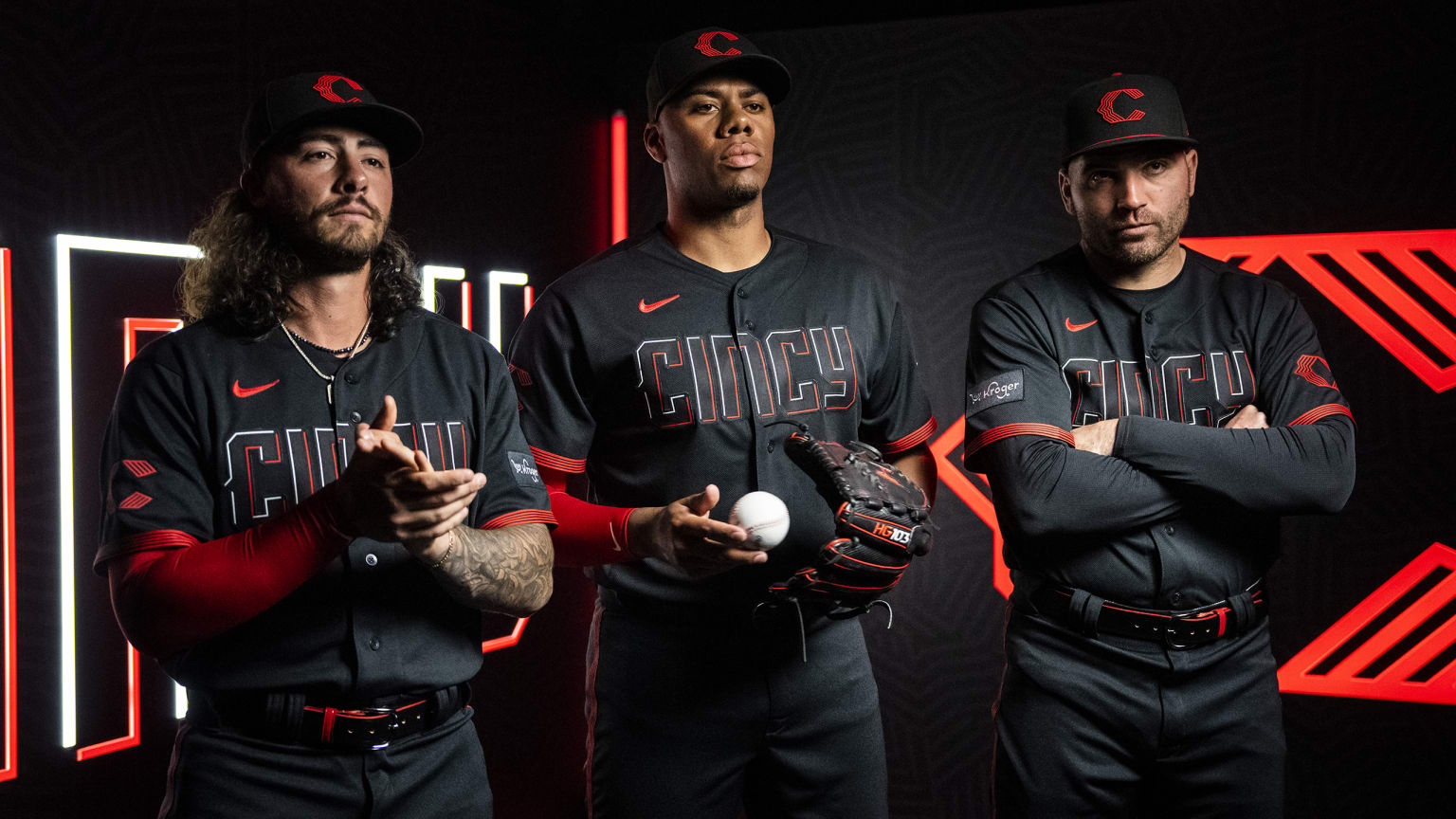 Jonathan India, Hunter Greene and Joey Votto model the Reds' new uniforms