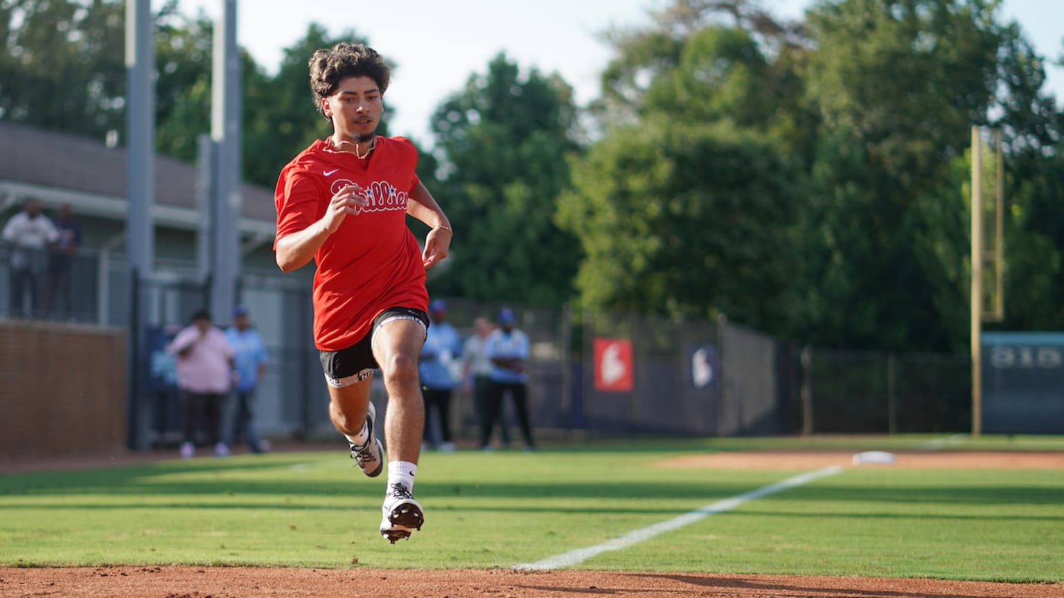 A participant from the Phillies Urban Youth Academy rounds the bases.