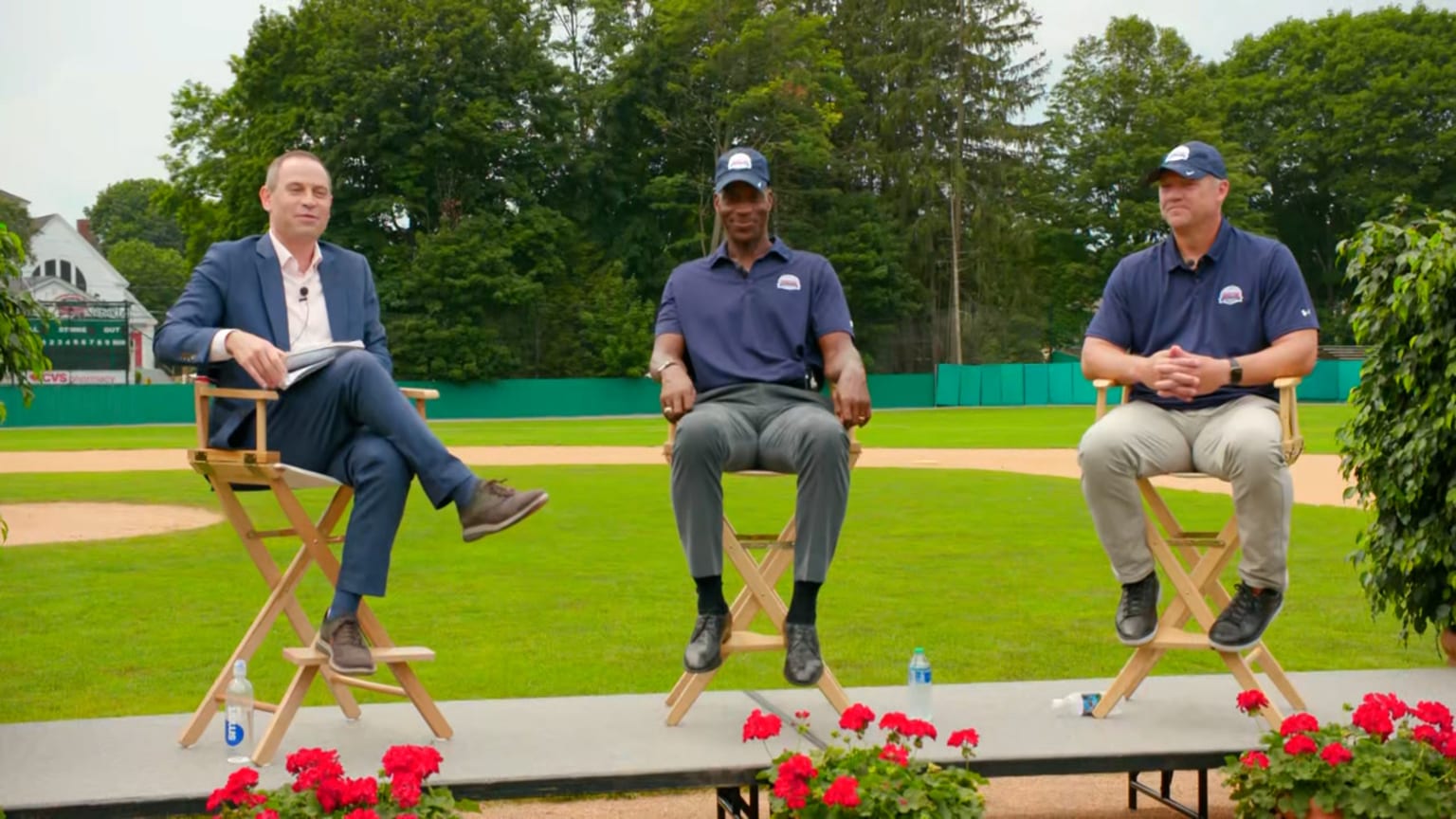 Jon Paul Morosi, Fred McGriff and Scott Rolen sit in chairs at Doubleday Field
