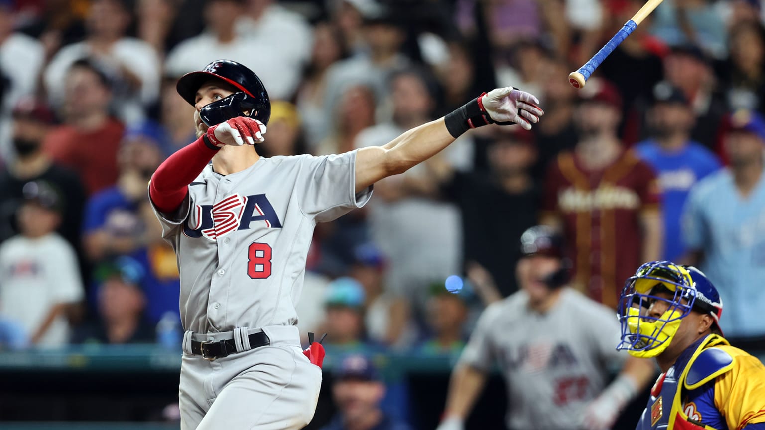 Trea Turner follows through on a swing