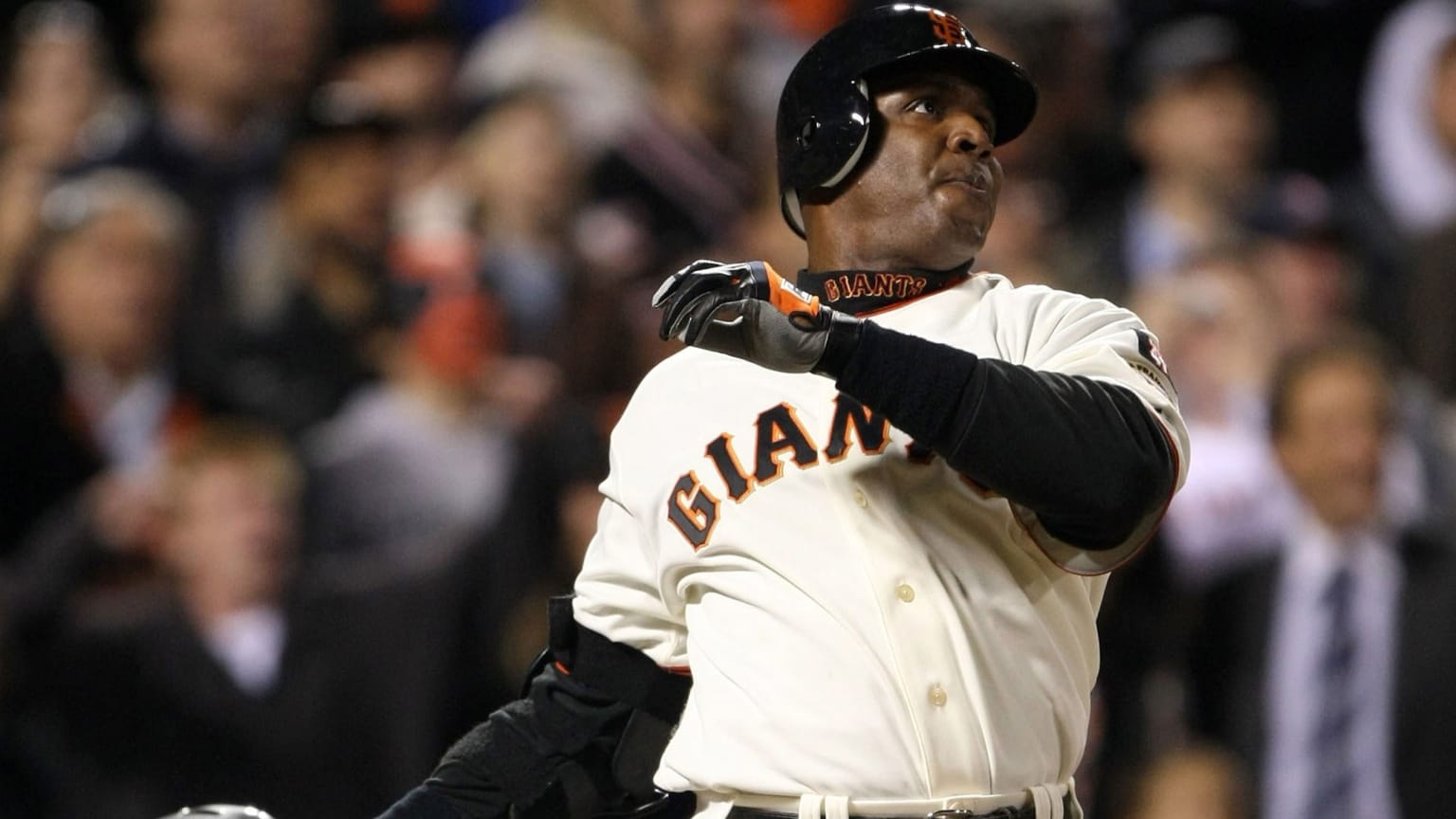 Barry Bonds follows through on a swing with the Giants