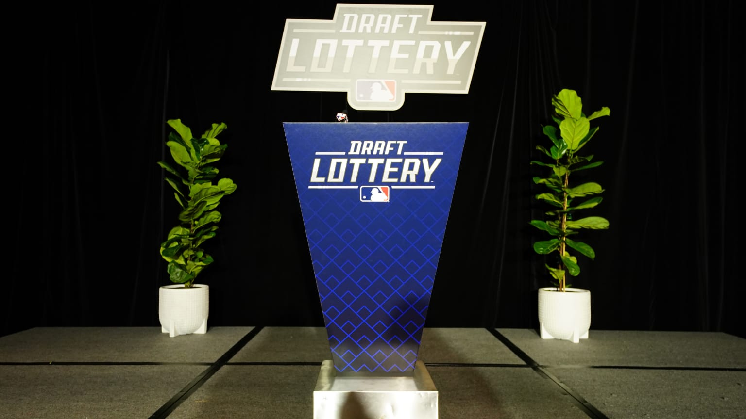 A podium with the Draft Lottery logo