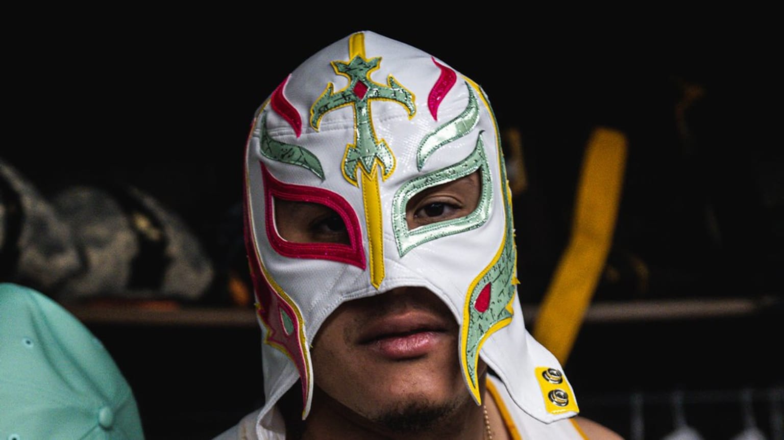 Manny Machado is pictured wearing a wrestling mask