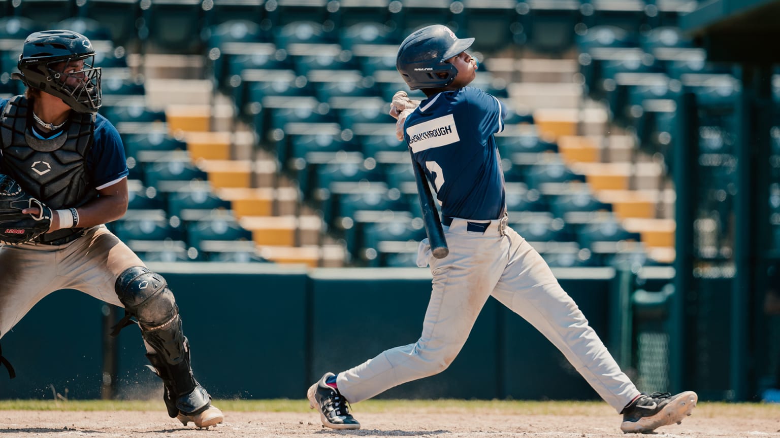 Adrián Beltré Jr. follows through on a swing