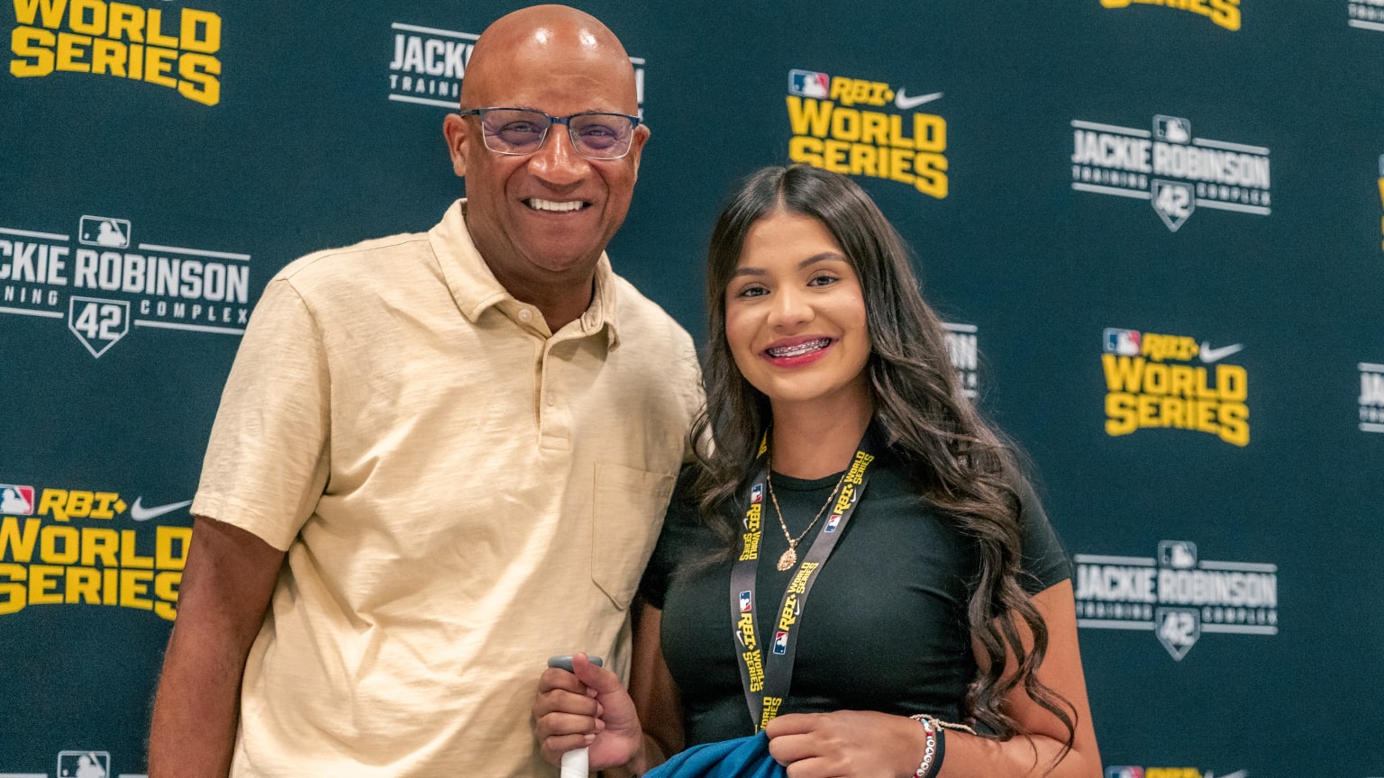 An RBI World Series representative with Breaking Barriers essay contest winner Isabel Hernandez