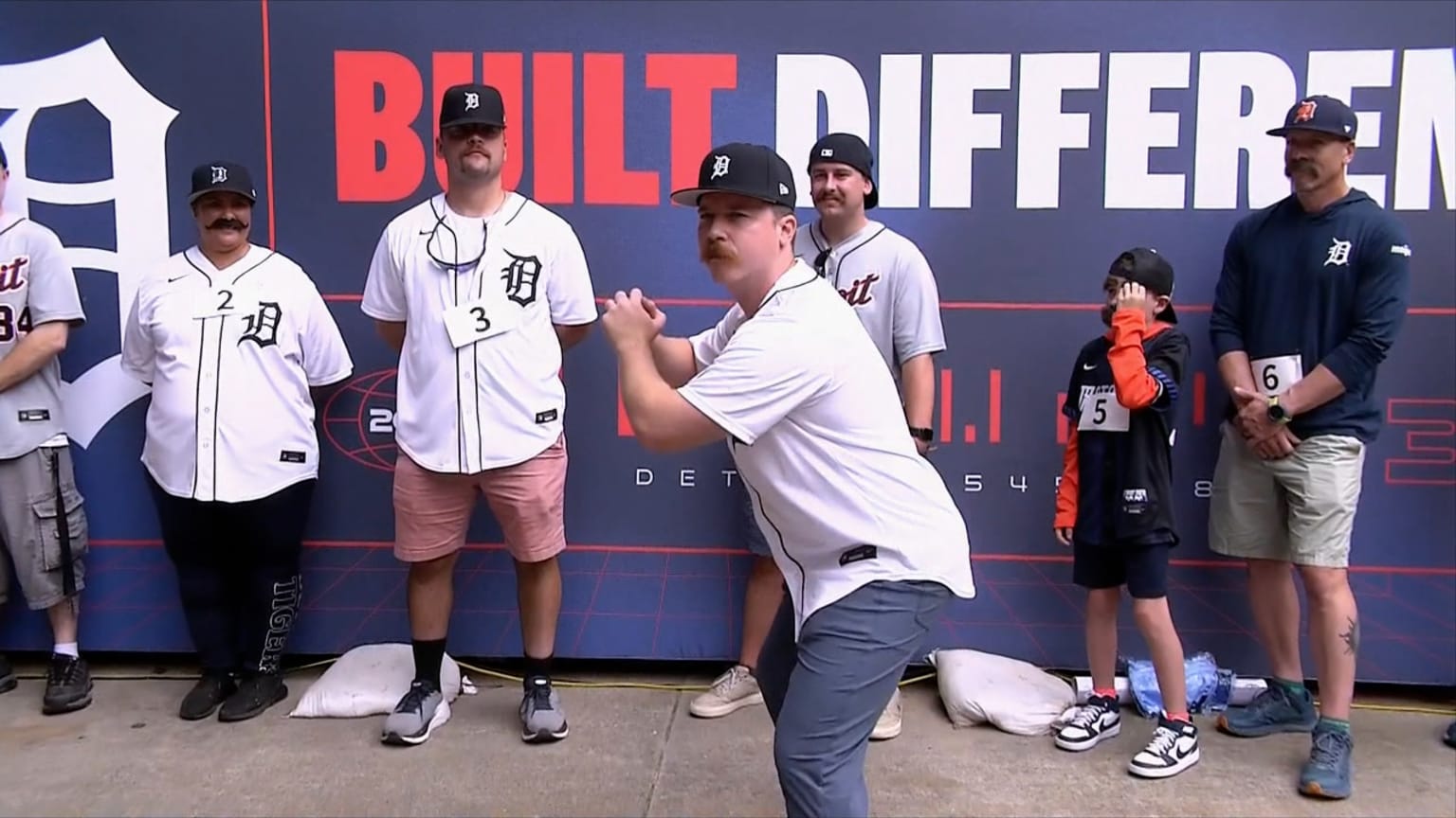 Fans don mustaches in a Jake Rogers lookalike contest